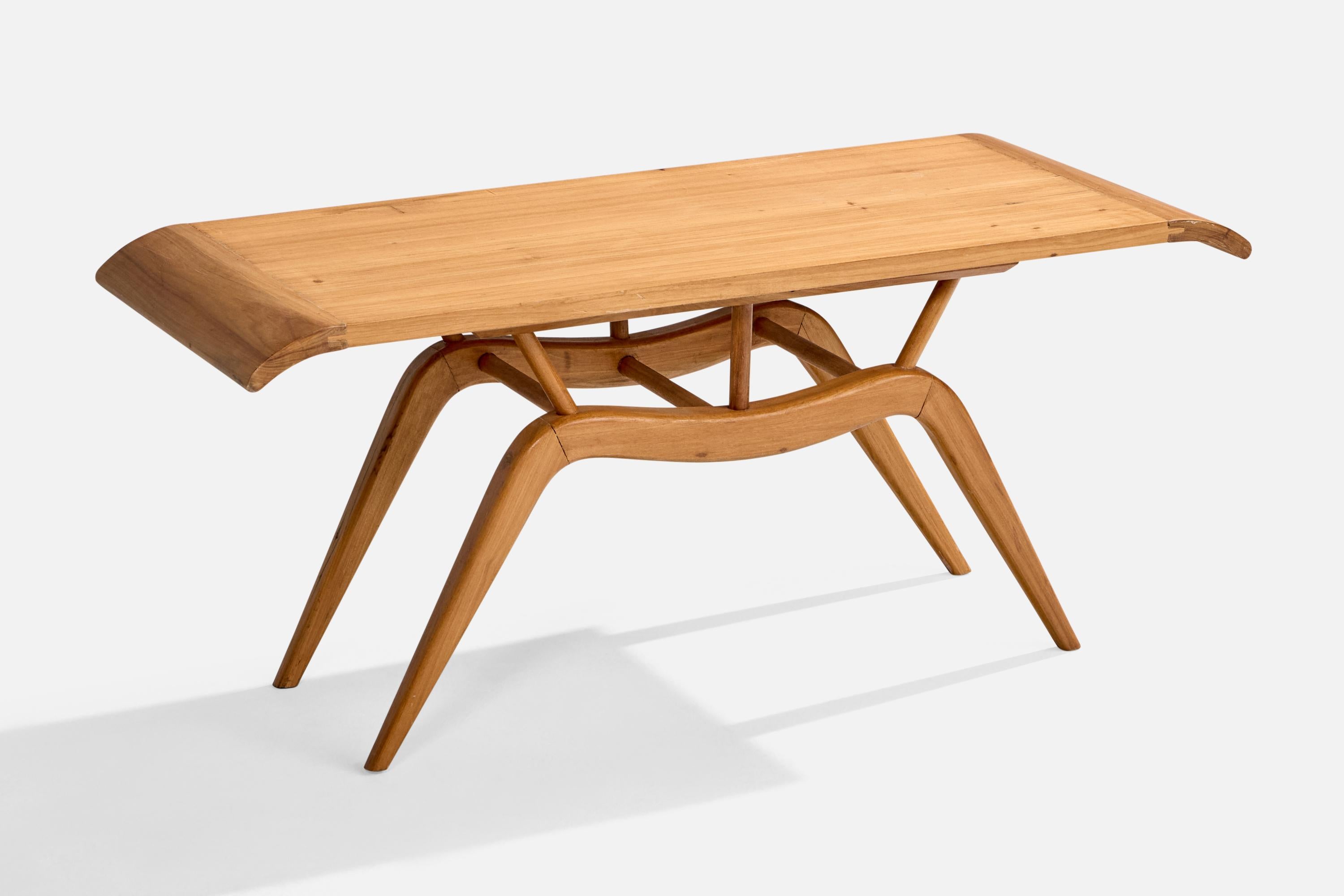 Mesa de centro de madera diseñada y fabricada en Brasil, c. 1950.

Dimensiones: 17,4