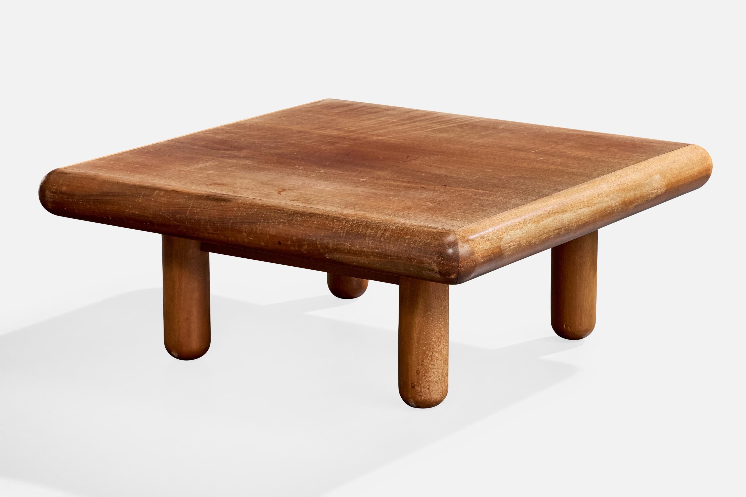 A wood coffee table designed and produced in Brazil, c. 1970s.

Wear consistent with age and use. Complimentary touch ups available upon request.

Overall Dimensions (inches): 16.0