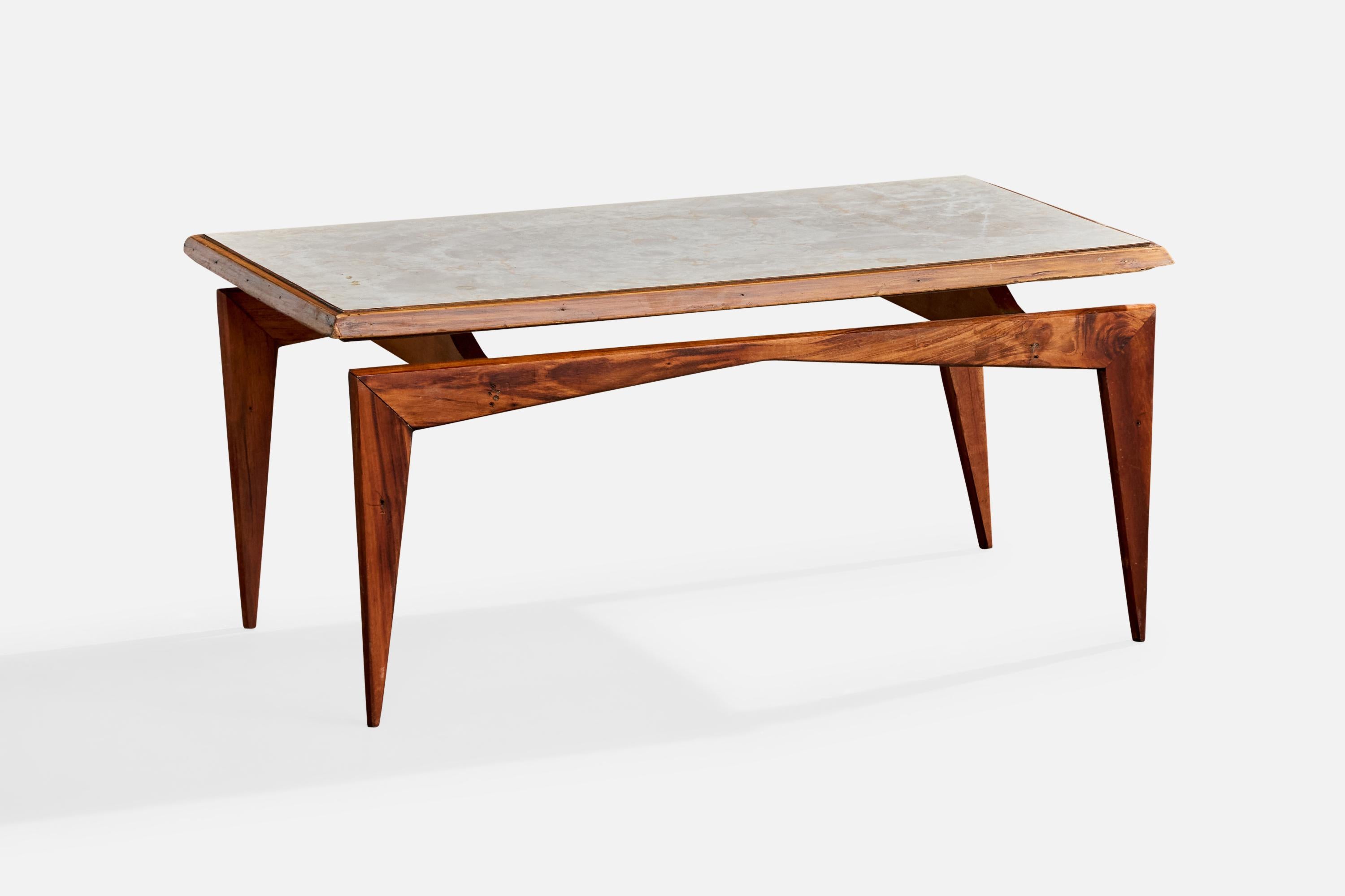 A wood and marble coffee table designed and produced in Brazil, c. 1950s.

Chips present to wood, complimentary touch-ups included upon request.

Overall Dimensions (inches): 15.0