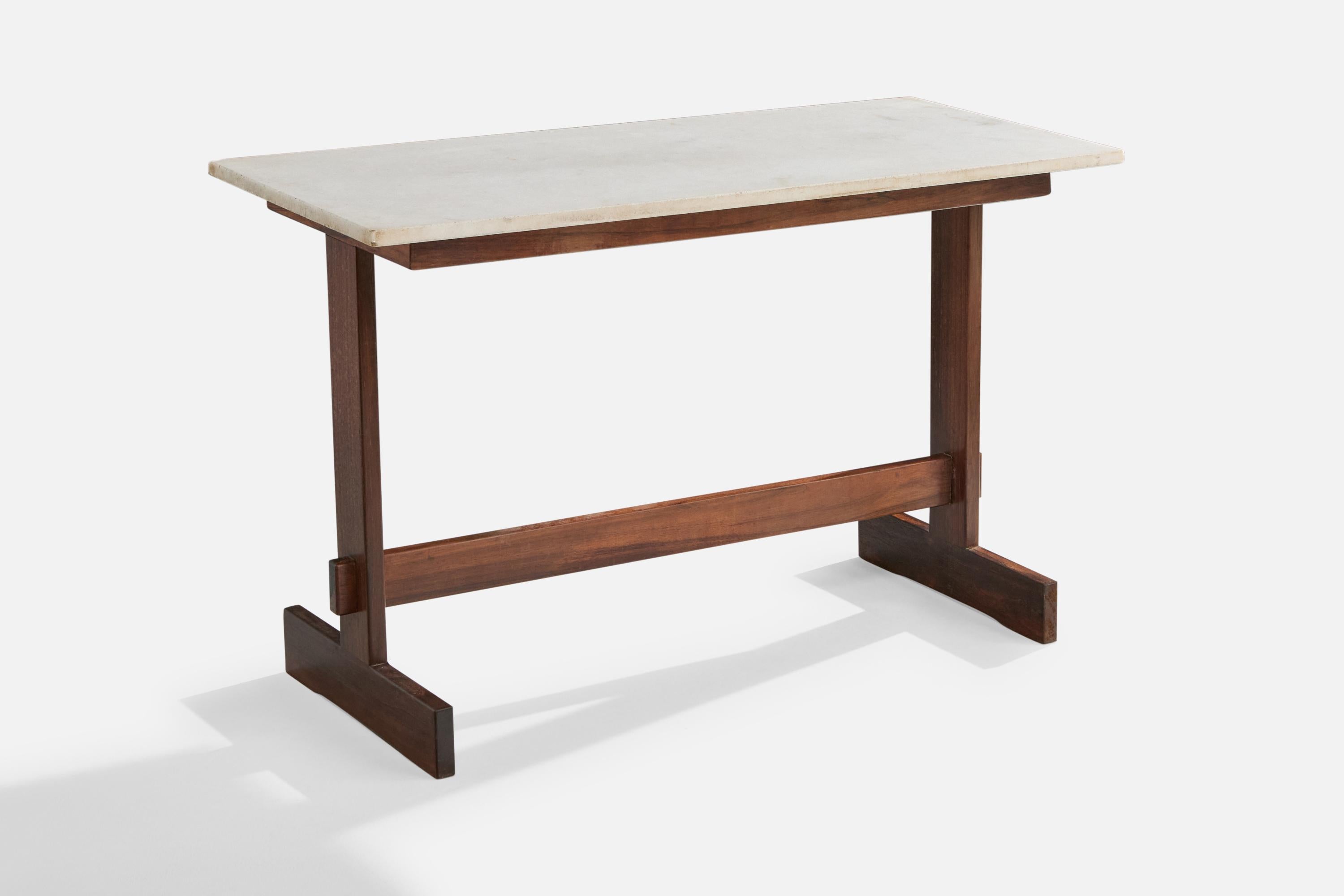 A wood and marble console or side table designed and produced in Brazil, c. 1960s.

Minor wear to corners of marble top.

Dimensions: 29.9” H x 48.4” W x 21.625” D
