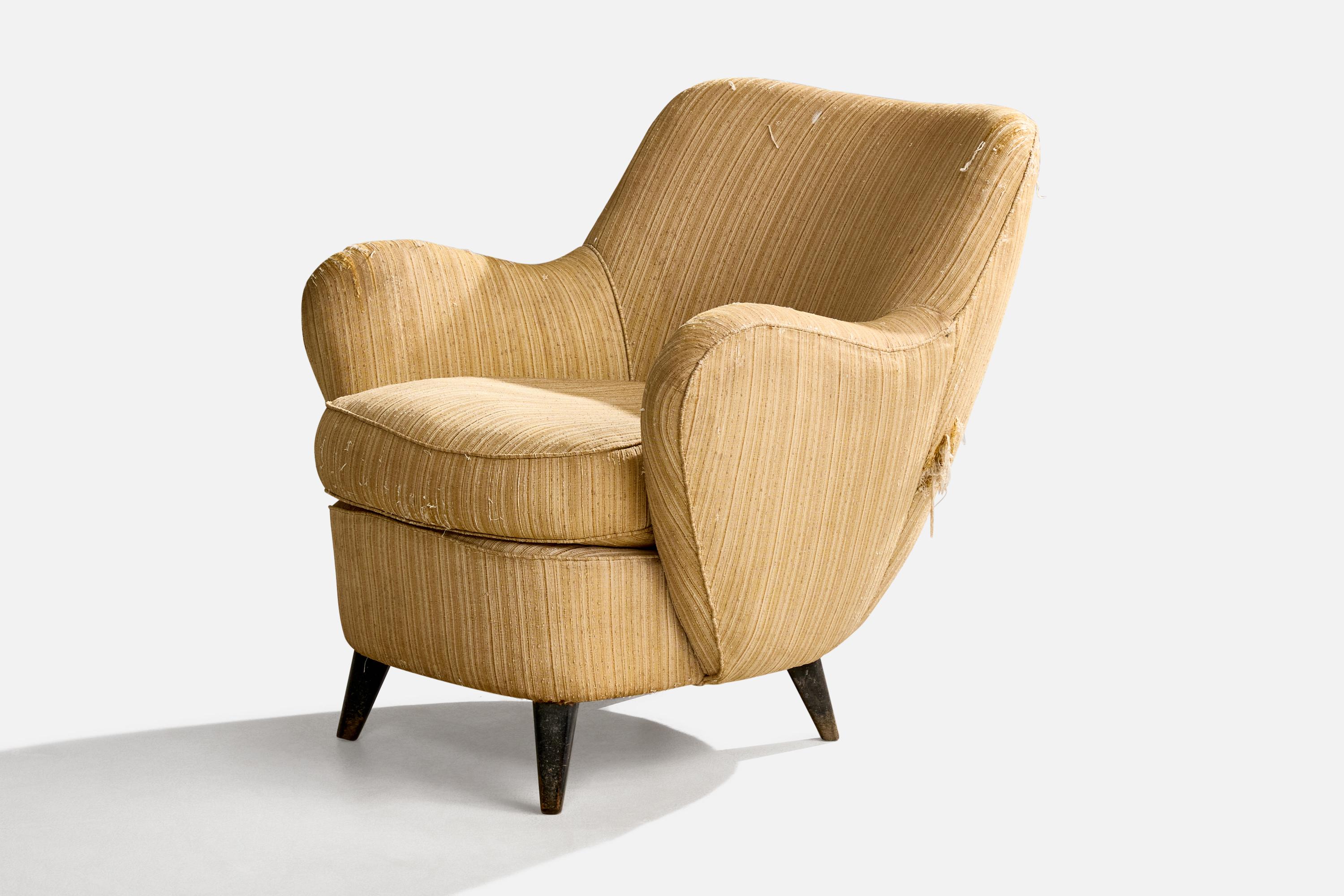 A beige fabric and dark-stained wood lounge chair designed and produced in Brazil, c. 1950s.

Overall Dimensions (inches): 29.25