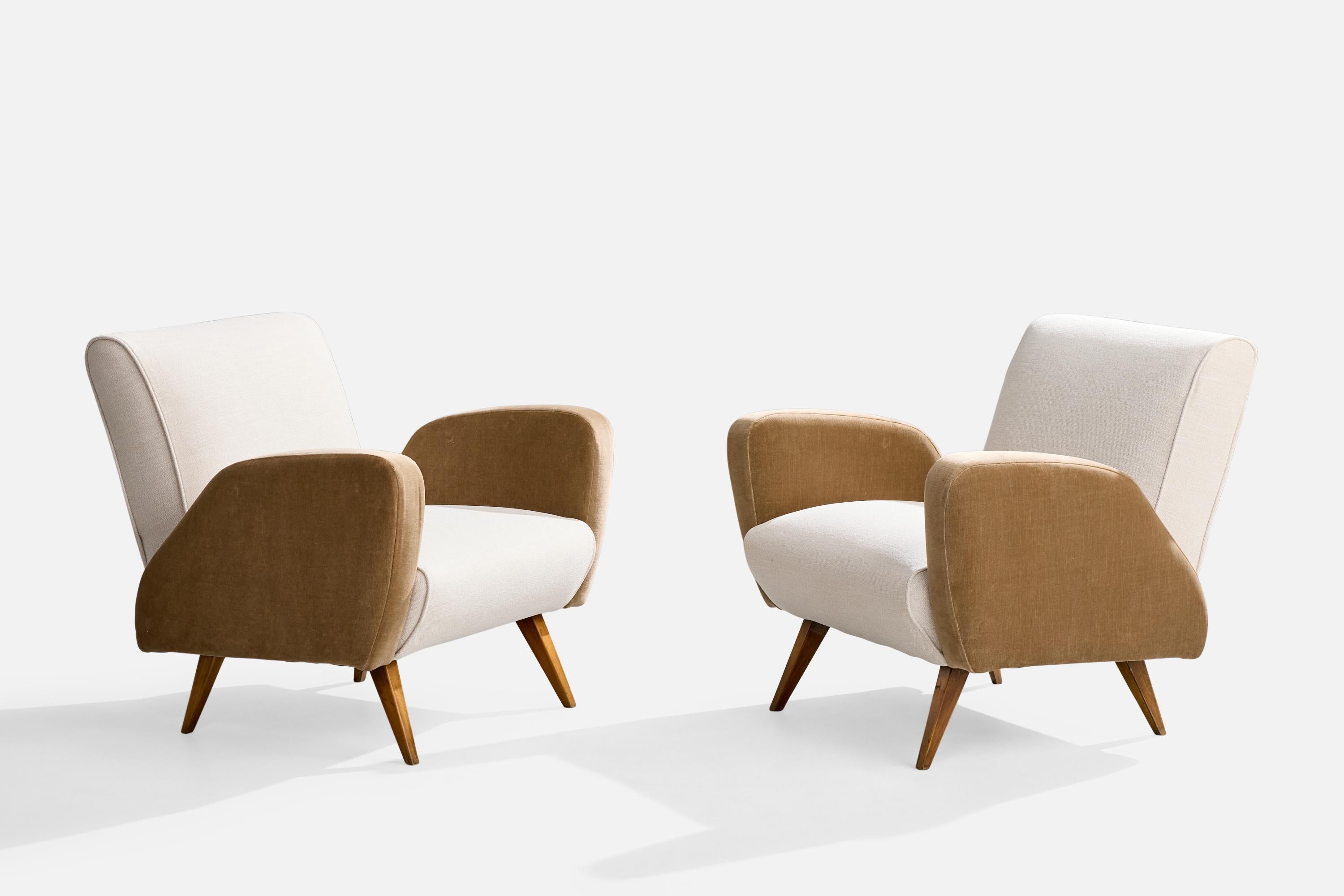 A pair of wood, white fabric and beige velvet lounge chairs designed and produced in Brazil, c. 1950s.

Overall Dimensions (inches): 29.25