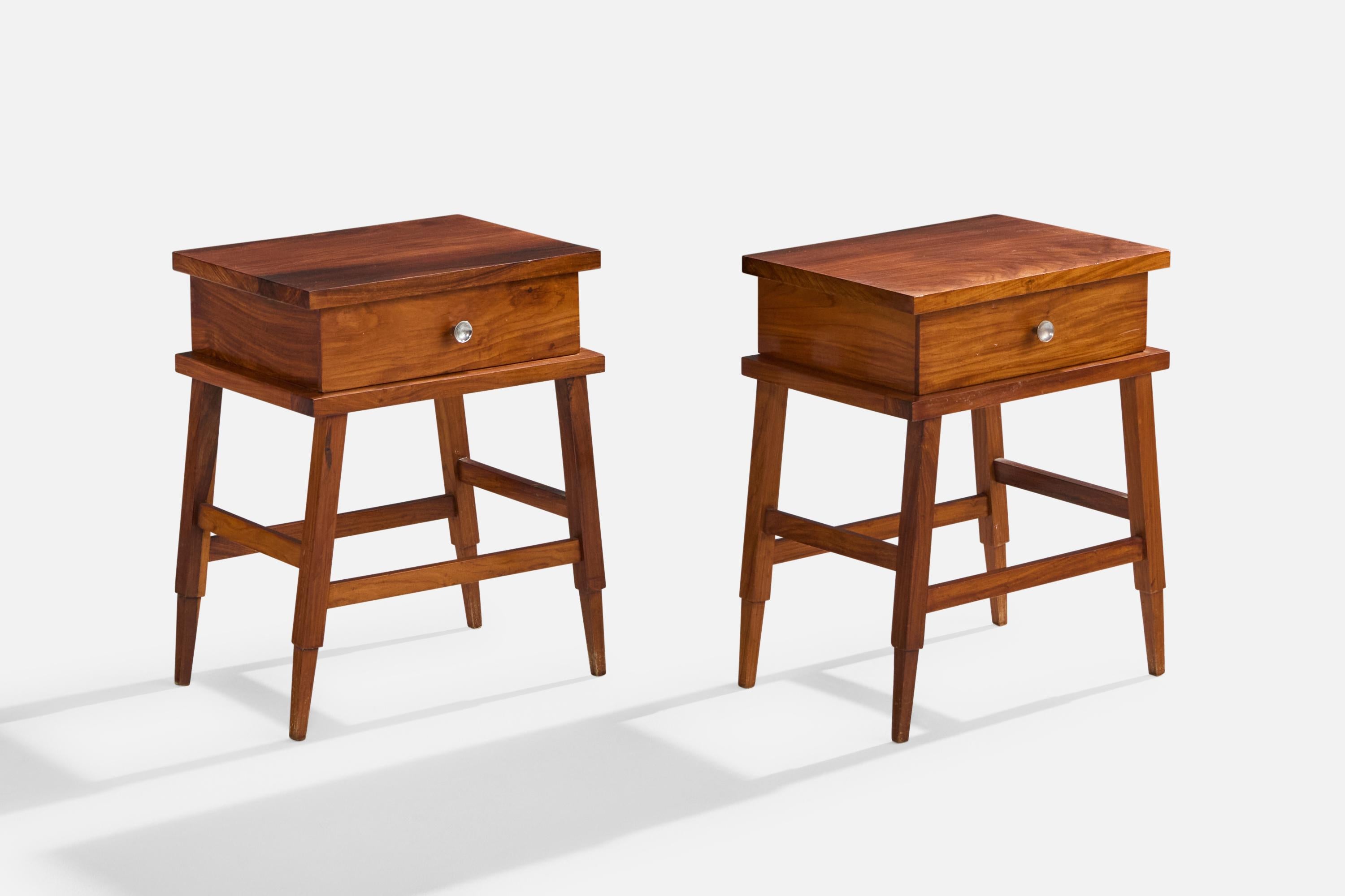 A pair of wood and metal nightstands produced in Brazil, c. 1950s.

Dimensions: 20.5” H x 16” W x 11.8“ D