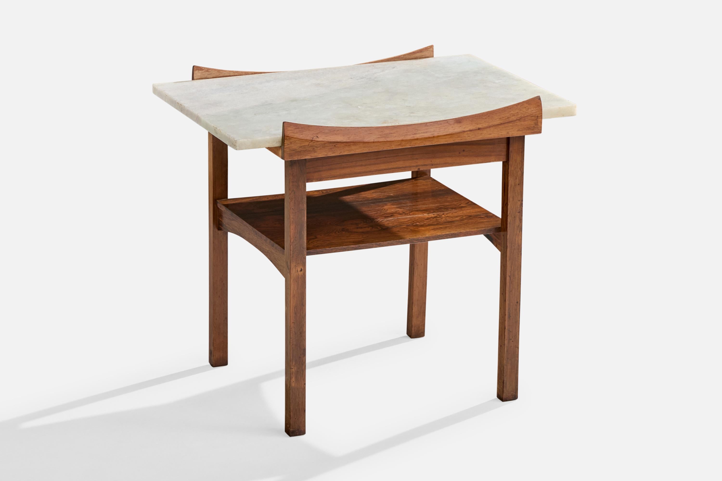 A wood and marble side table designed and produced in Brazil, c. 1960s.

Dimensions: 21.3” H x 23.75” W x 16.3” D