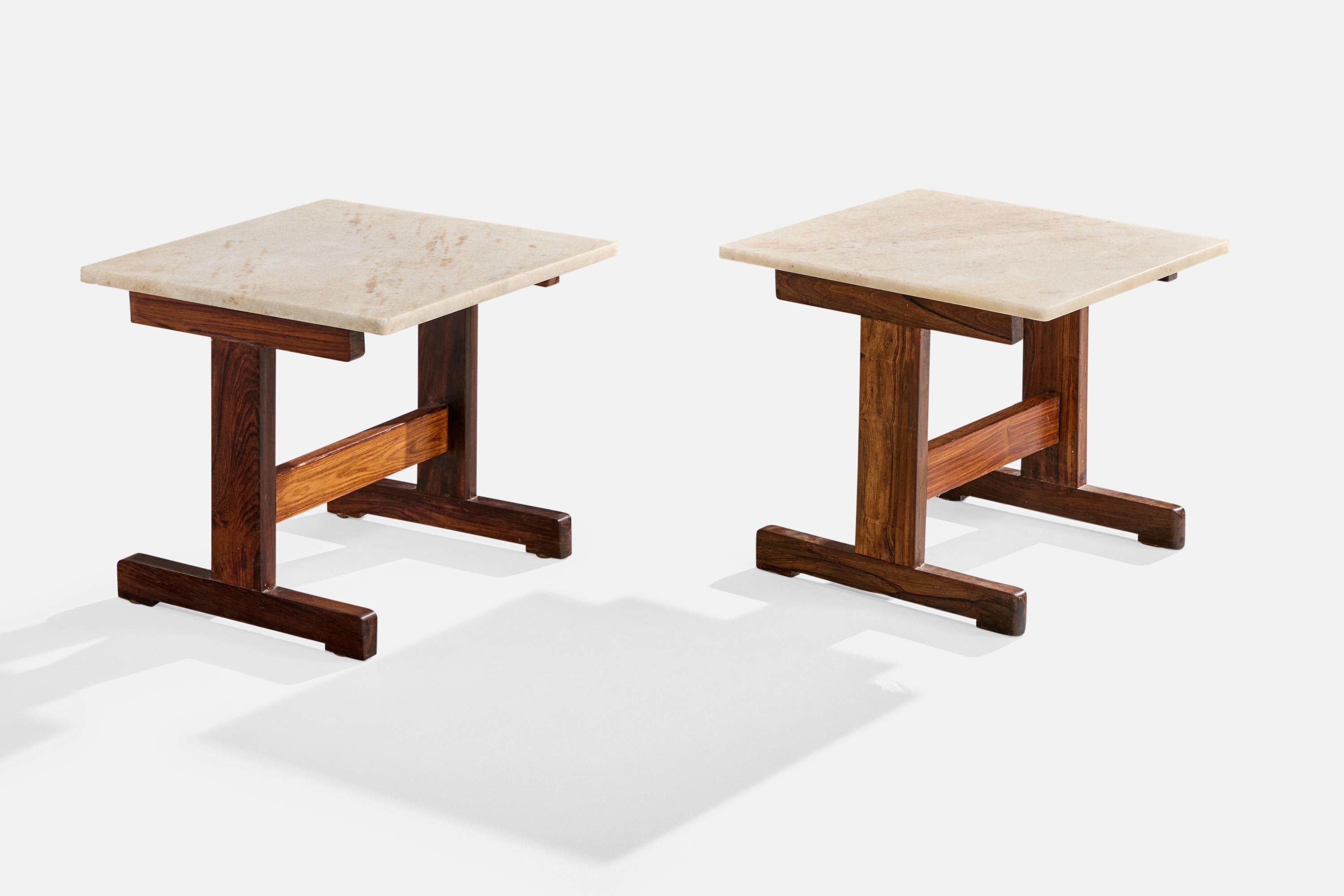 A pair of wood and marble side tables designed and produced in Brazil, c. 1960s.

Dimensions: 18.5” H x 19.7” W x 19.7” D 
