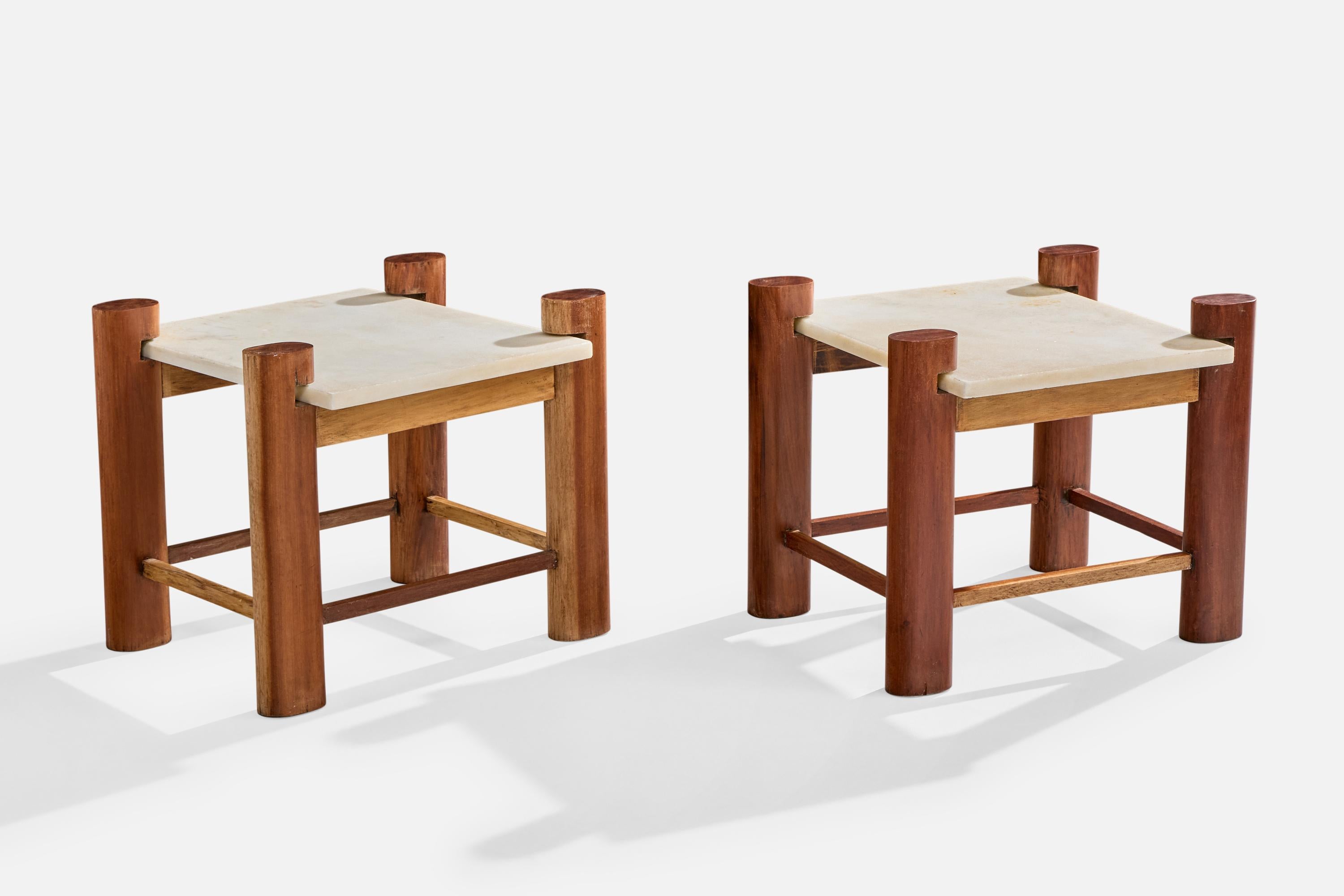 A pair of marble and wood side tables designed and produced in Brazil, c. 1960s.

Dimensions: 17.5” H x 18.9” W x 21.1” D