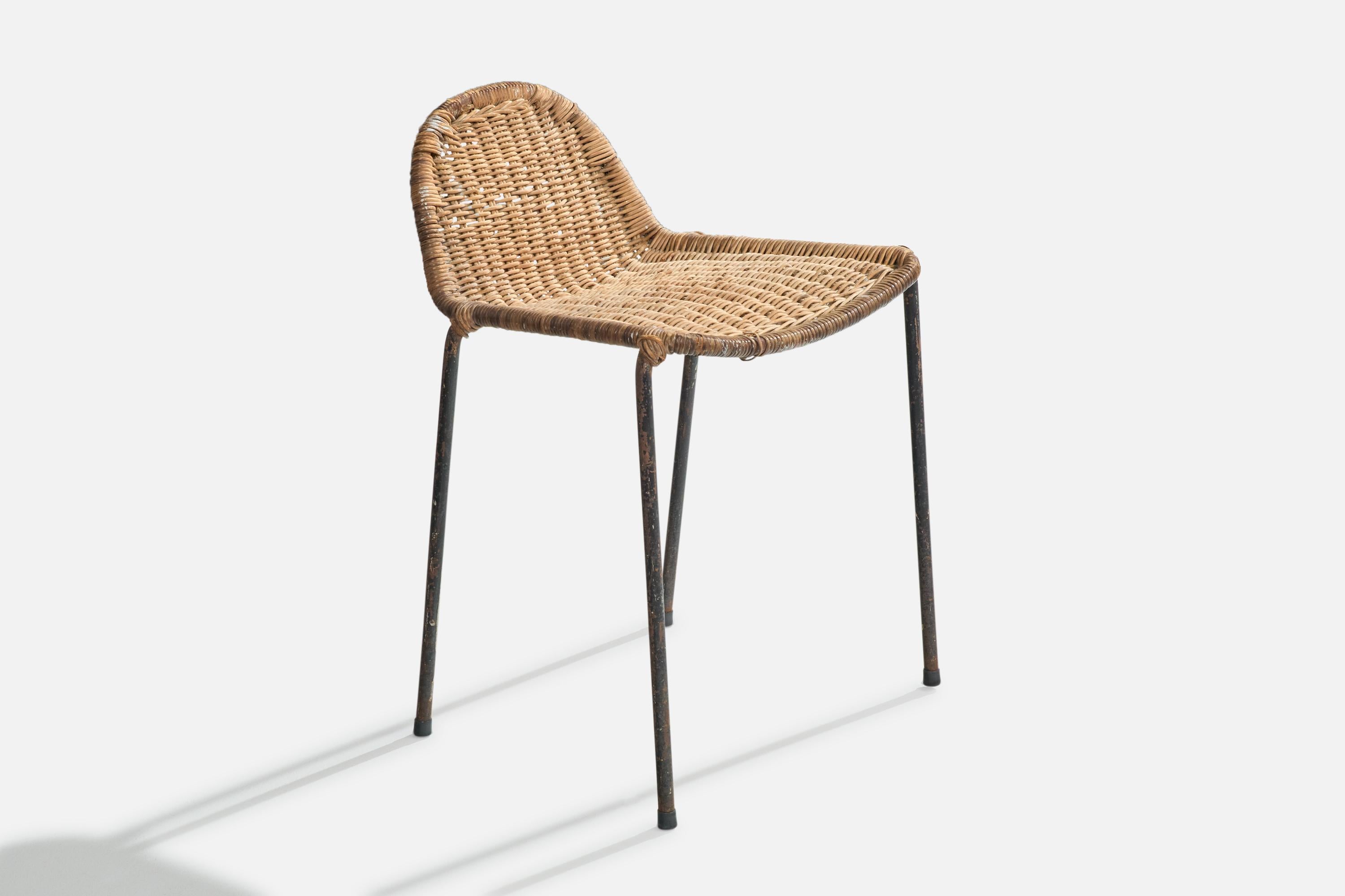 A black-painted iron and rattan stool designed and produced in Brazil, c. 1950s.

Heavy oxidation to iron legs, light discoloration to wicker backrest. Release to wicker, light touch ups available upon request.

Dimensions: 24.8” H x 18.3” W x 17”