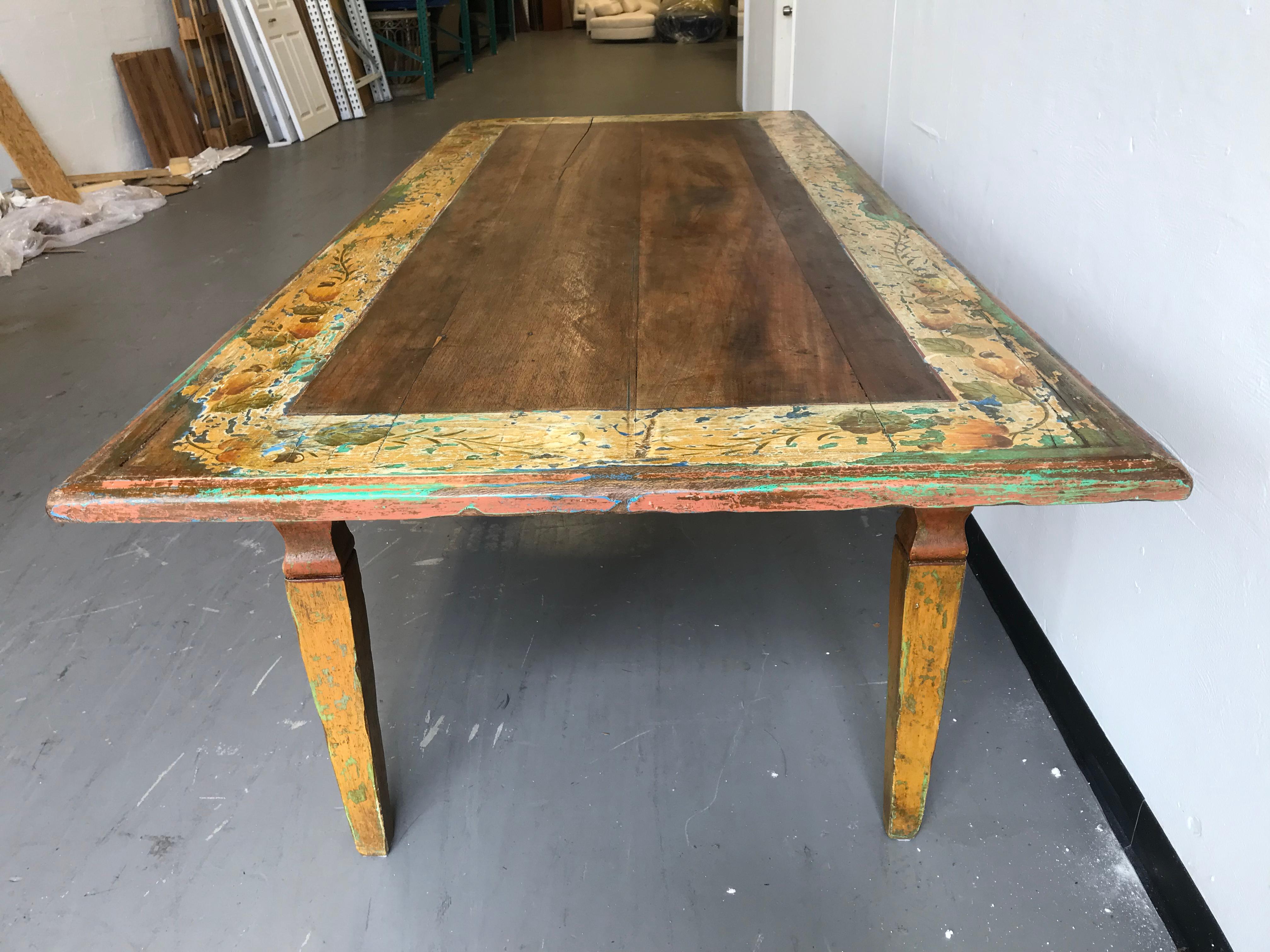 This incredible dining room table is from Brazil. It is labeled Art by Minas. Very sturdy and kind of primitive chic.