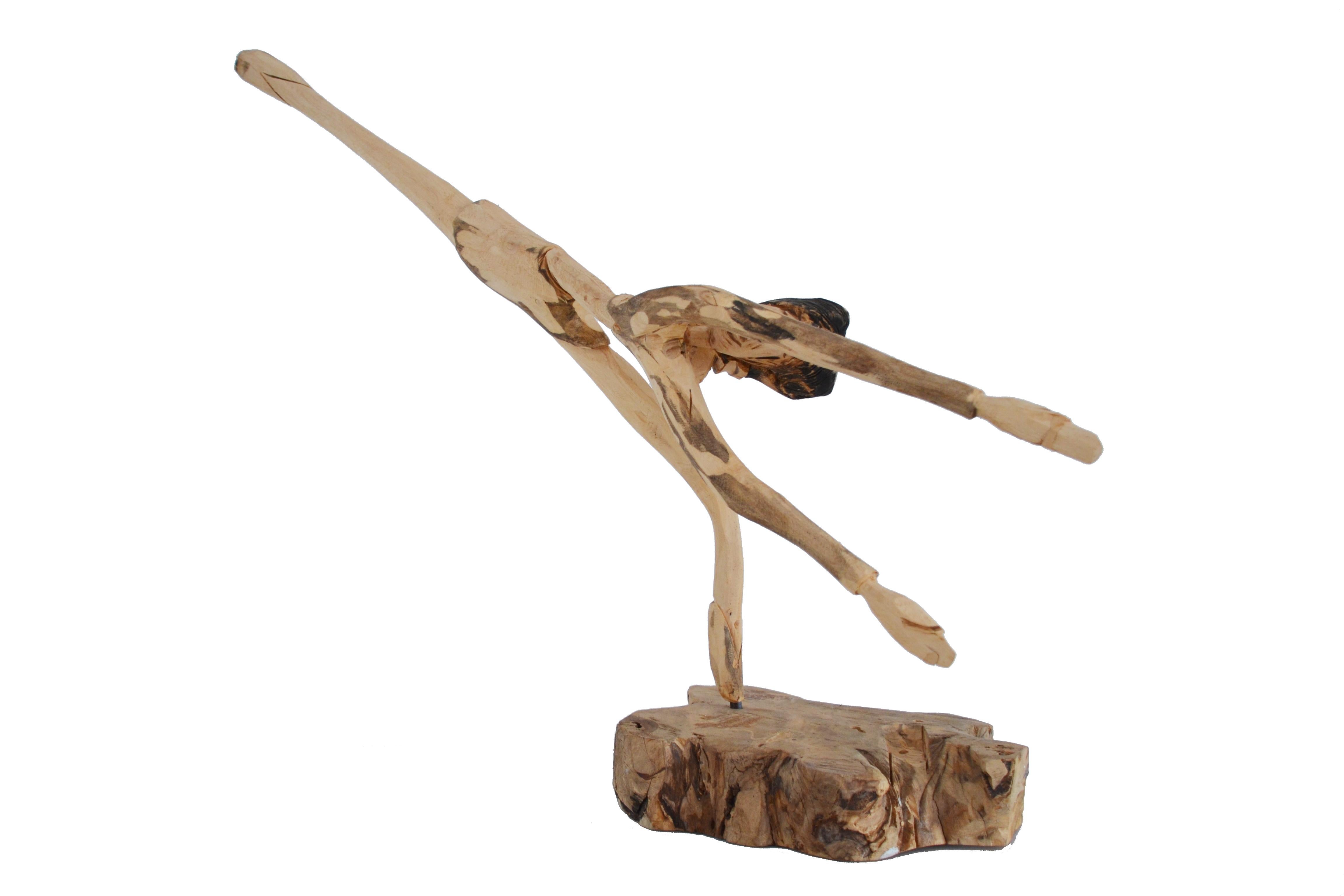 Unique piece by the Brazilian artist Cícero Rodrigues, from Petrolina, Pernambuco. This is one of the many wooden ballerinas from his collection. His ballerinas represent the female body, the constant movement of life and through the wood-carving,