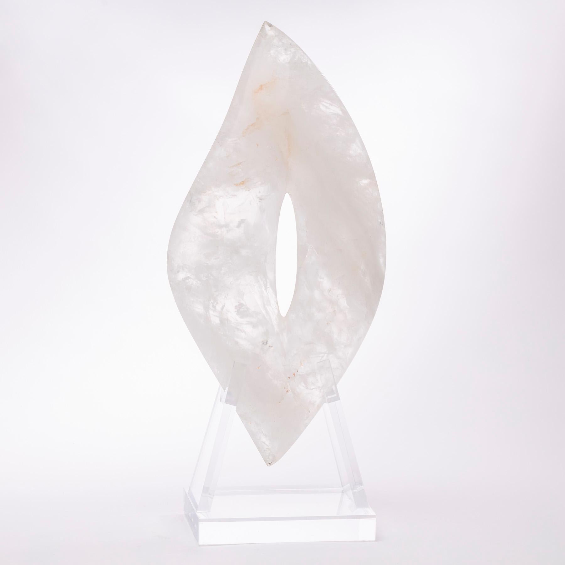 Brazilian white quartz sculpture mounted on custom acrylic base.
       
