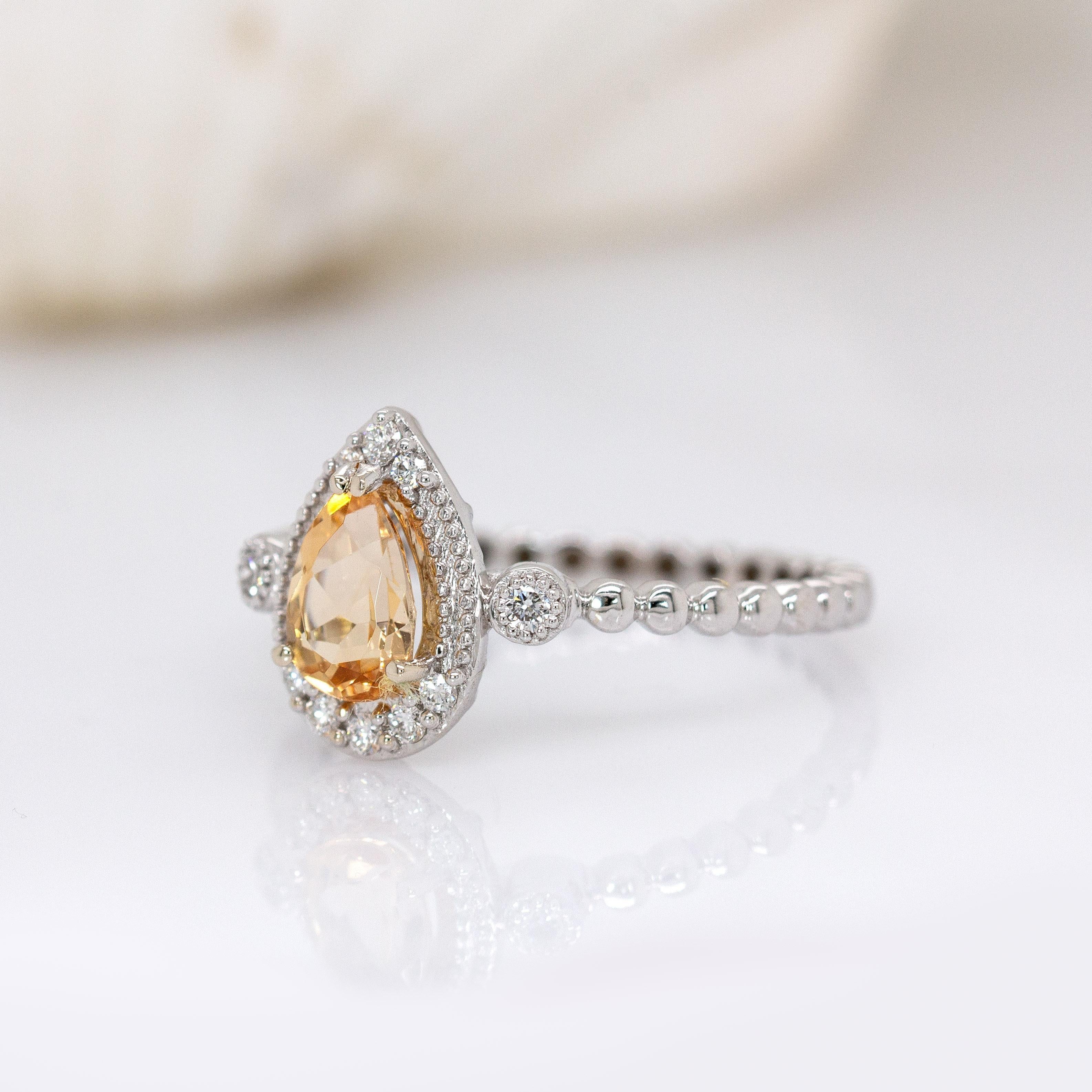 Taille poire Bague en or blanc massif 14K avec topaze brésilienne et halo en diamant naturel en vente