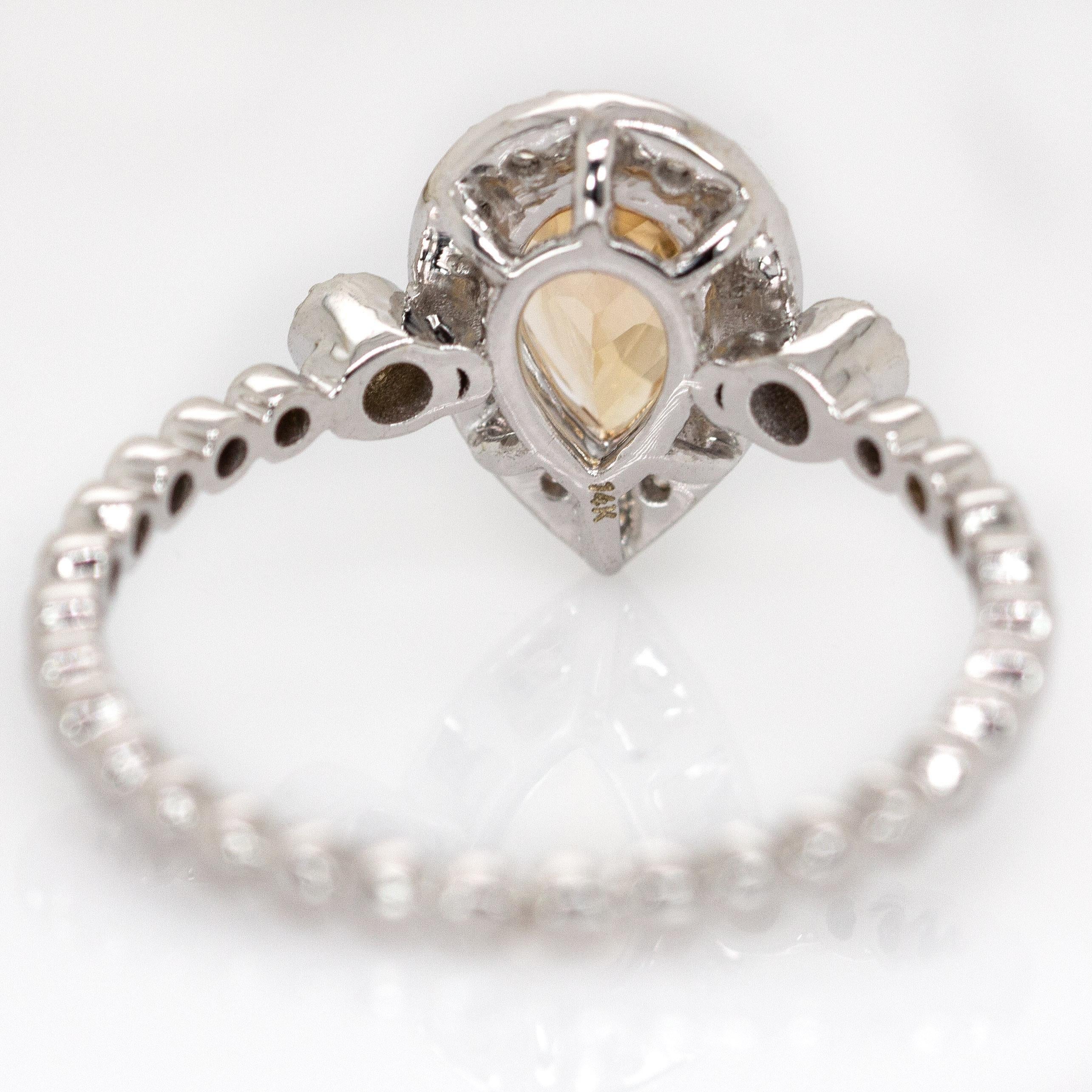 Bague en or blanc massif 14K avec topaze brésilienne et halo en diamant naturel en vente 1