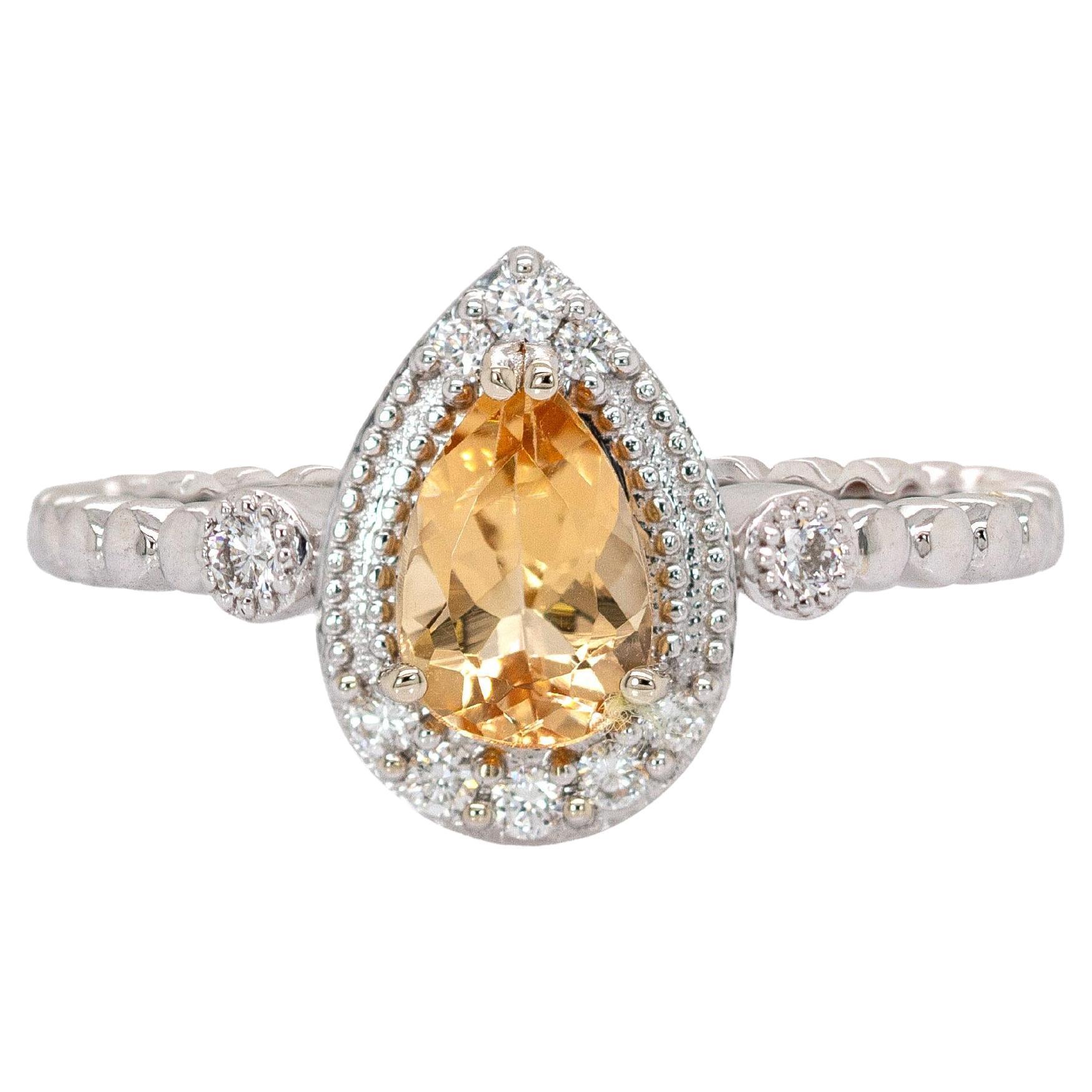 Bague en or blanc massif 14K avec topaze brésilienne et halo en diamant naturel