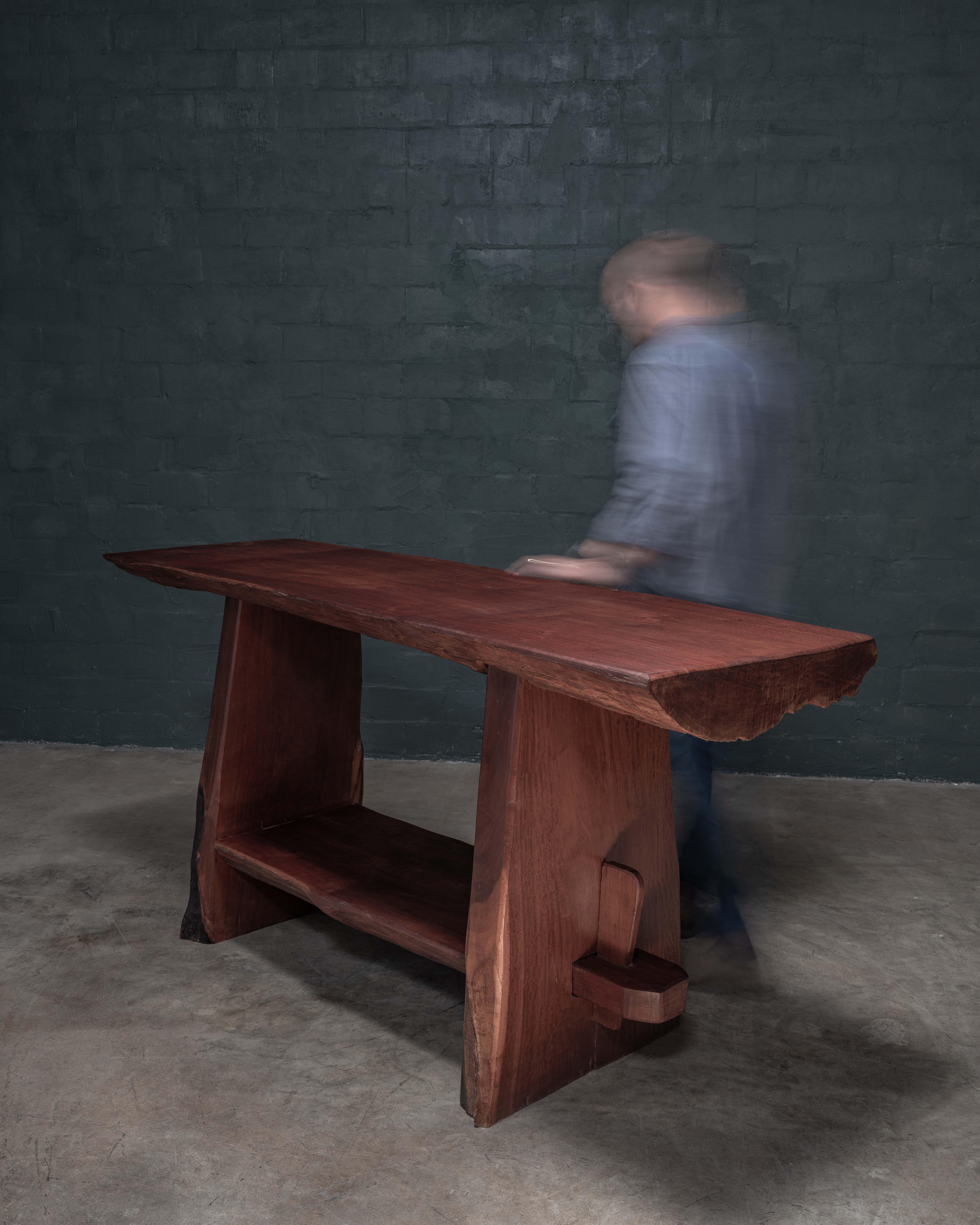 Handcrafted in the Pará region of Brazil, this exceptional 6-foot bar and buffet table is made from reclaimed Ipe wood, originally crafted in 2008. Each piece carries a story of sustainability and heritage, transforming salvaged Brazilian hardwoods