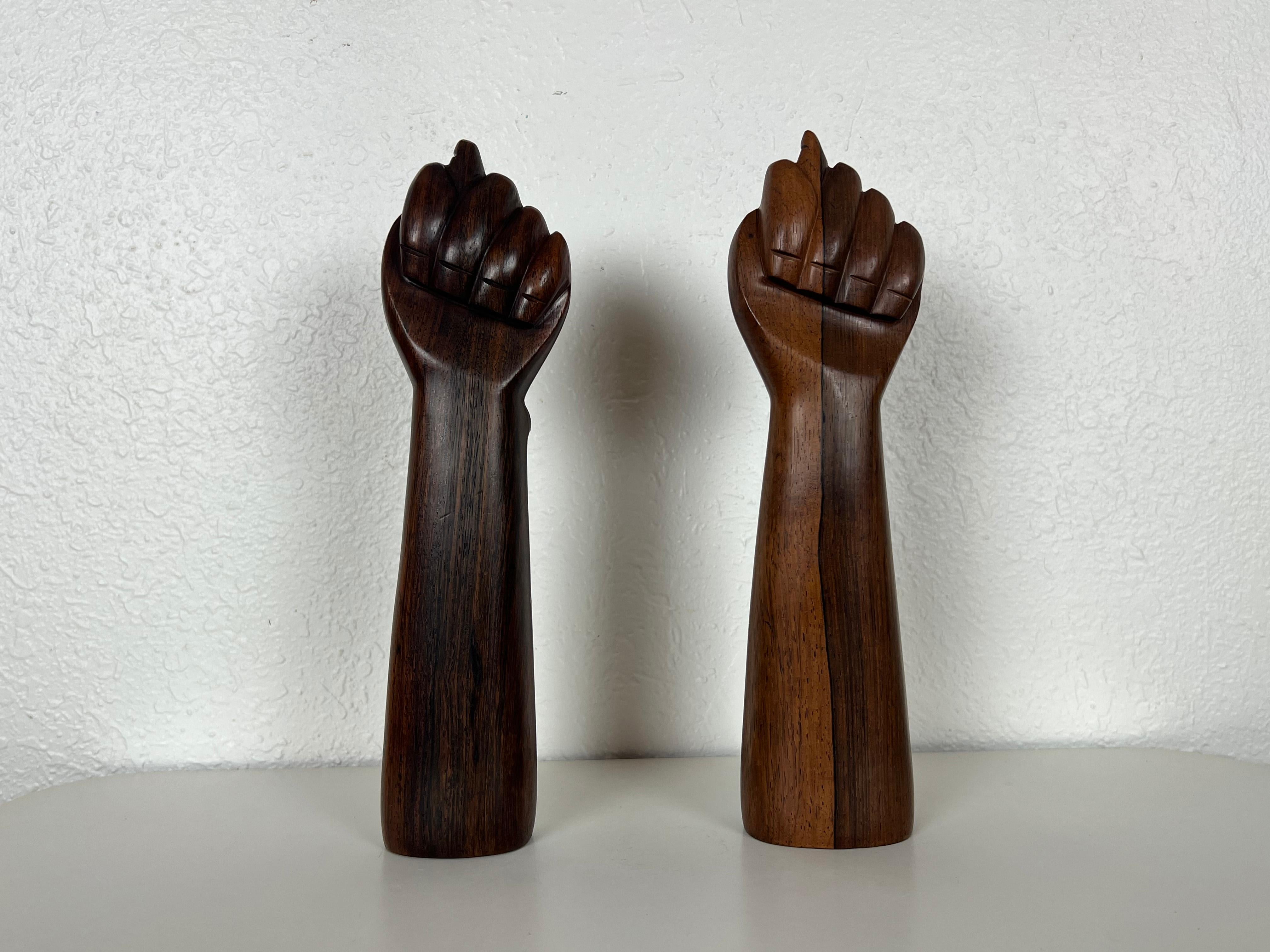 Vintage pair of hand sculptures crafted in solid Jacaranda Rosewood made in Brazil by Jac Arte. Original labels present on both pieces. 

Maker: Jac Arte

Origin: Brazil

Year: 1960s

Style: Mid-Century Modern / Brazilian