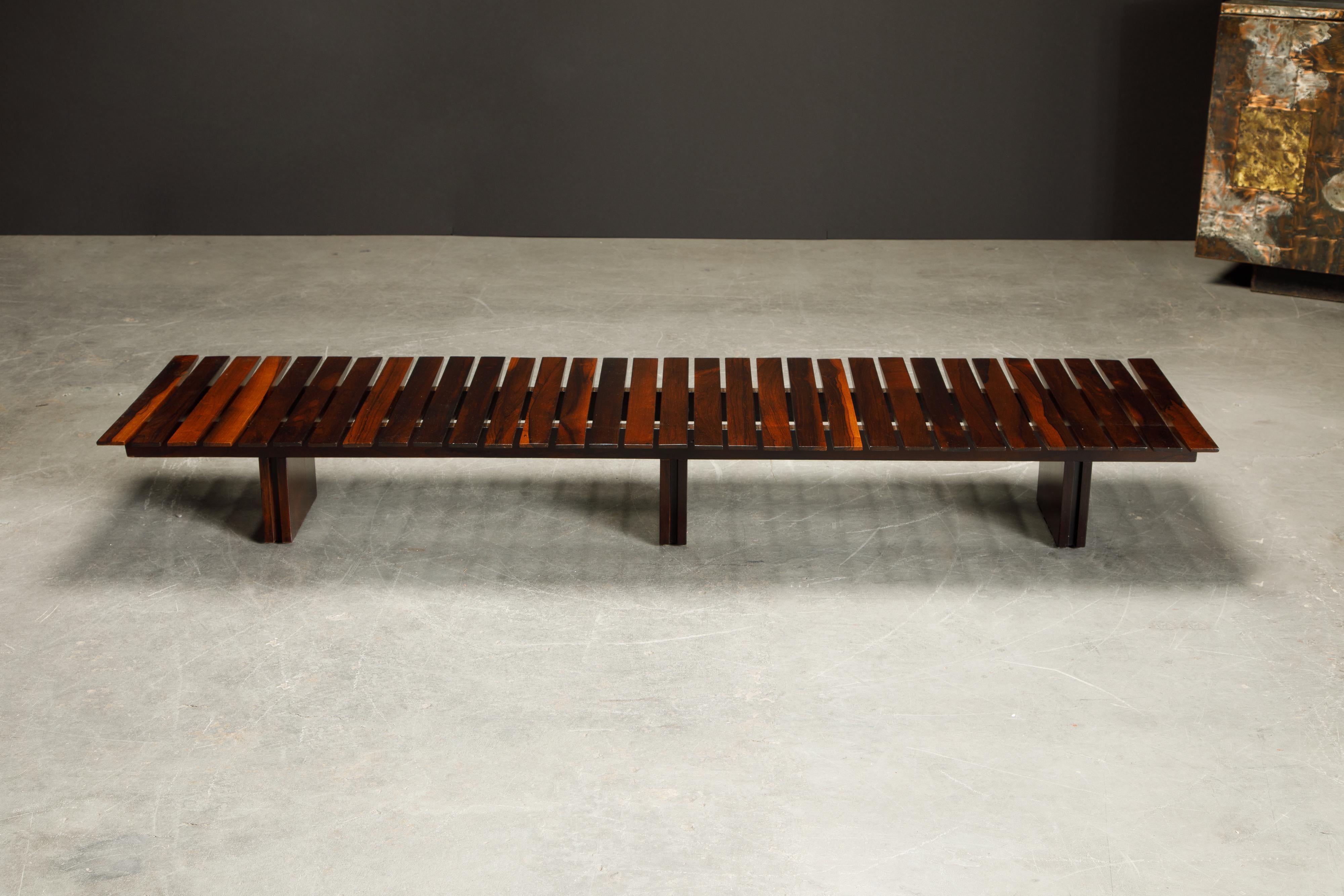This incredible Brazilian Modern slatted Jacaranda Rosewood bench or low table was originally made in the 1960s. We sourced this piece near Rio (Brazil) and just completed restoration on it. Featuring 81