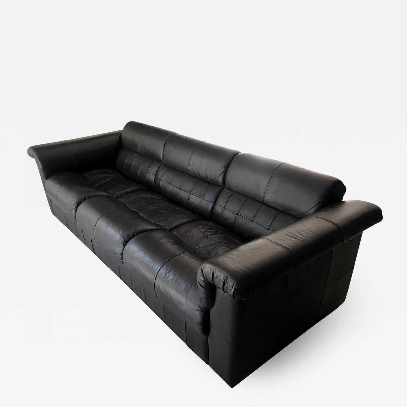A three-seat armed sofa by Percival Lafer, made in Brazil circa 1970s. Wood frame with complete leather cover. The sofa was constructed as a modular pieces for easy dissemble and assemble. The seats and arms can be taken off individually for