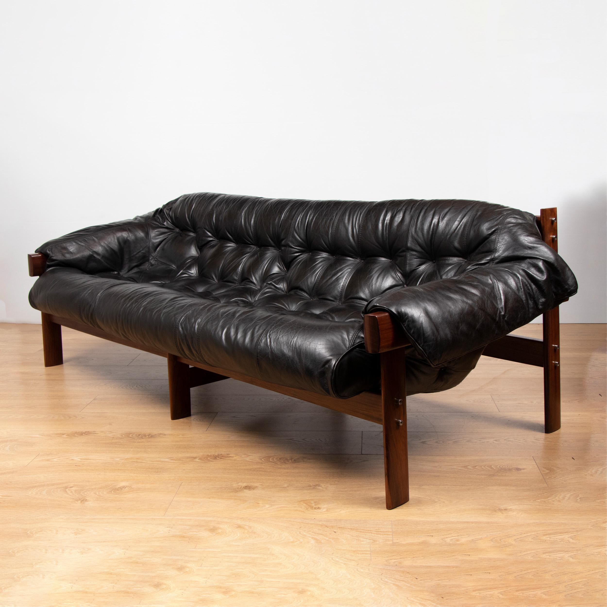 Brazilian leather tufted sofa by Percival Lafer, circa 1960.