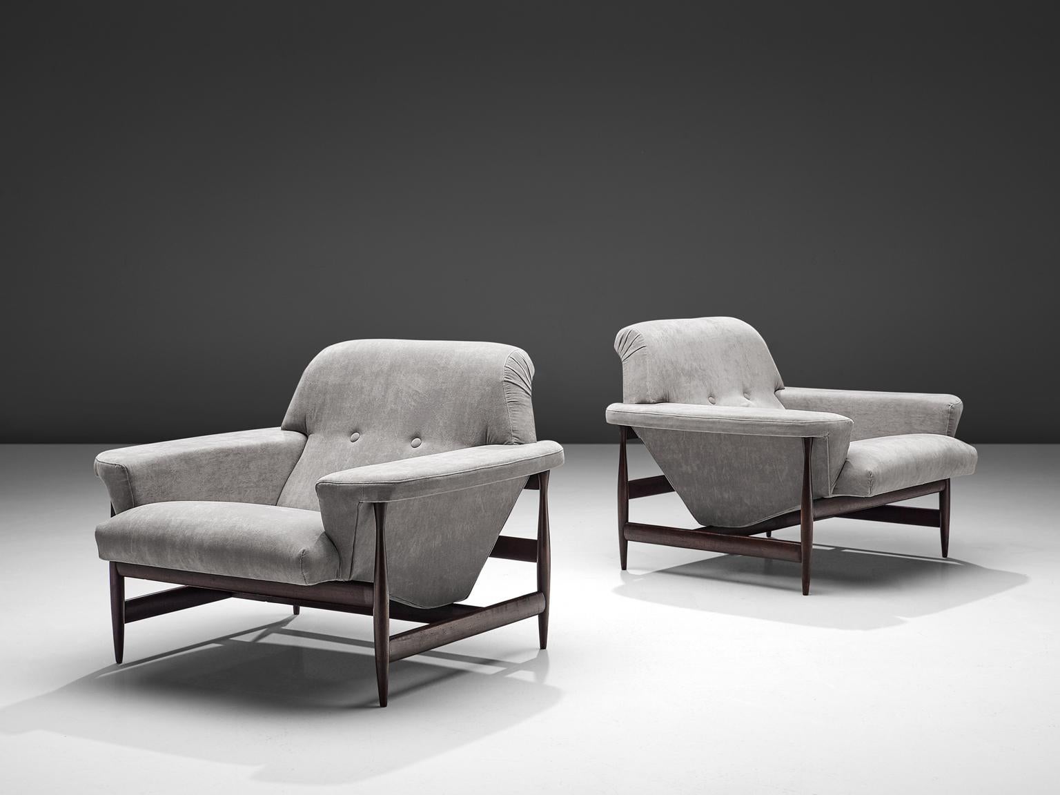 Pair of Brazilian lounge chairs, grey fabric and wood, Brazil, 1960.

This set of elegant easy chairs are from Brazilian origin. These armchairs are extremely comfortable, due their great proportions and shell like thick cushions. The frame has a