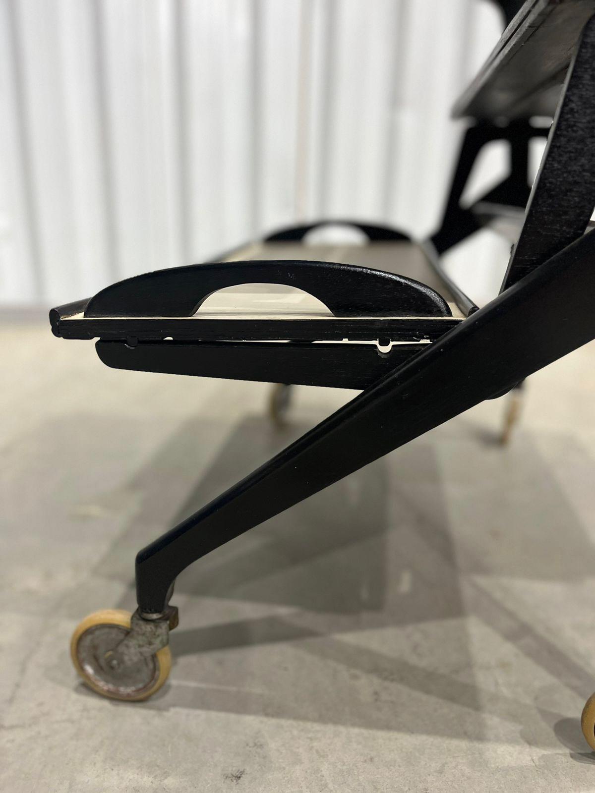Available today, with domestic shipping in the NYC metro area included, this Brazilian Mid-Century Bar Cart in Hardwood by Carlo Hauner and Martin Eisler for Moveis Artesanal, 1950’s, is nothing less than gorgeous! 

This bar cart, crafted in the