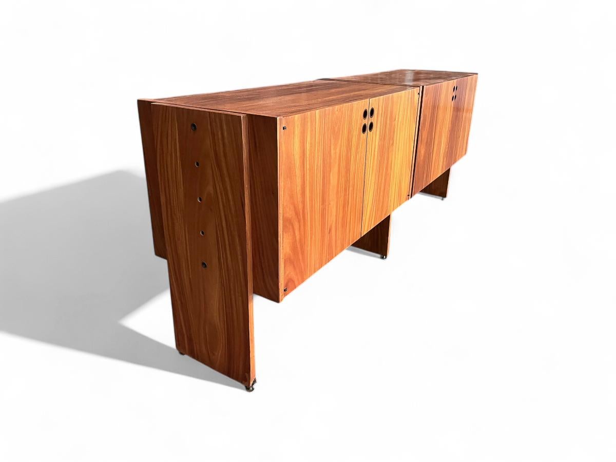 Available today, with domestic shipping in the NYC metro area included, this Brazilian Mid-Century Credenza in Hardwood by Geraldo de Barros, c. 1970s, is nothing less than gorgeous!

This credenza is crafted from hardwood, featuring a sleek design