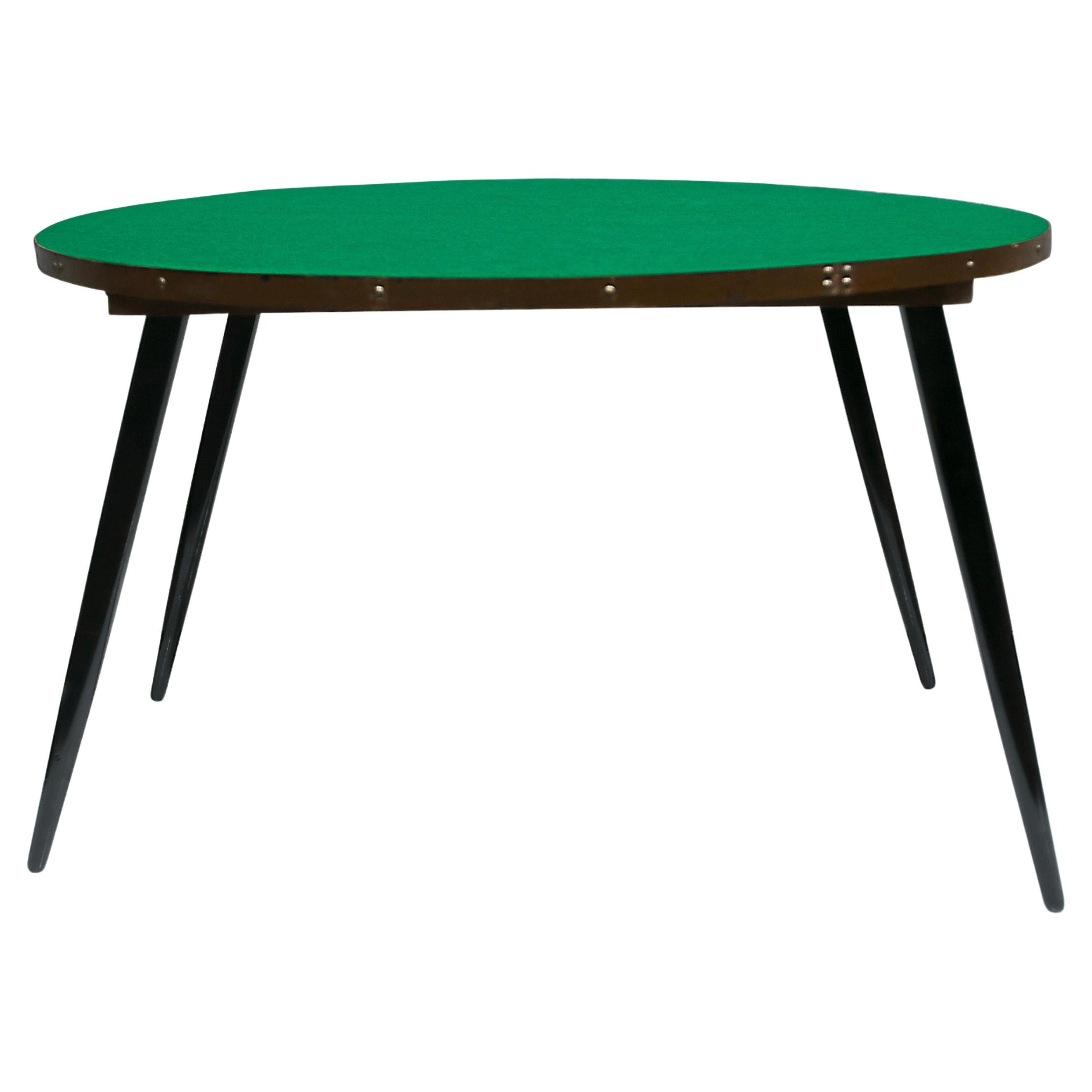Available today, with domestic shipping in the NYC metro area included, this Brazilian Mid-Century Game Table in Wood & Green Felt, by Gelli Moveis, c. 1950s is nothing less than gorgeous! The table frame is crafted from a luxurious black and brown