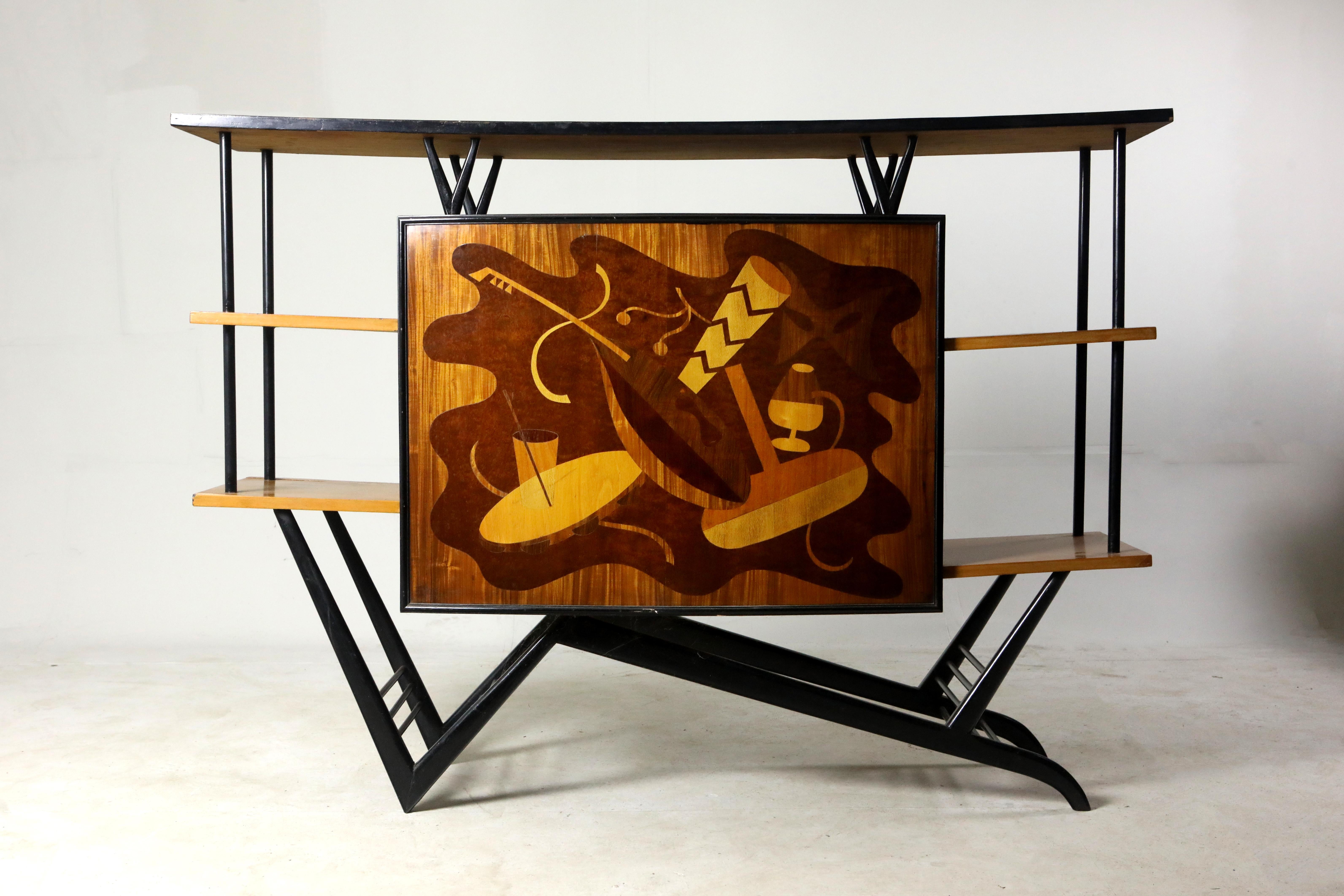 Brazilian Mid-Century Modern Musical Theme Marquetry Dry Bar, Brazil, 1950s

This charming 1950s dry bar is structured in solid ebonized wood and displays Formica shelves and a fine ornate marquetry front decorated with musical themed motifs, built