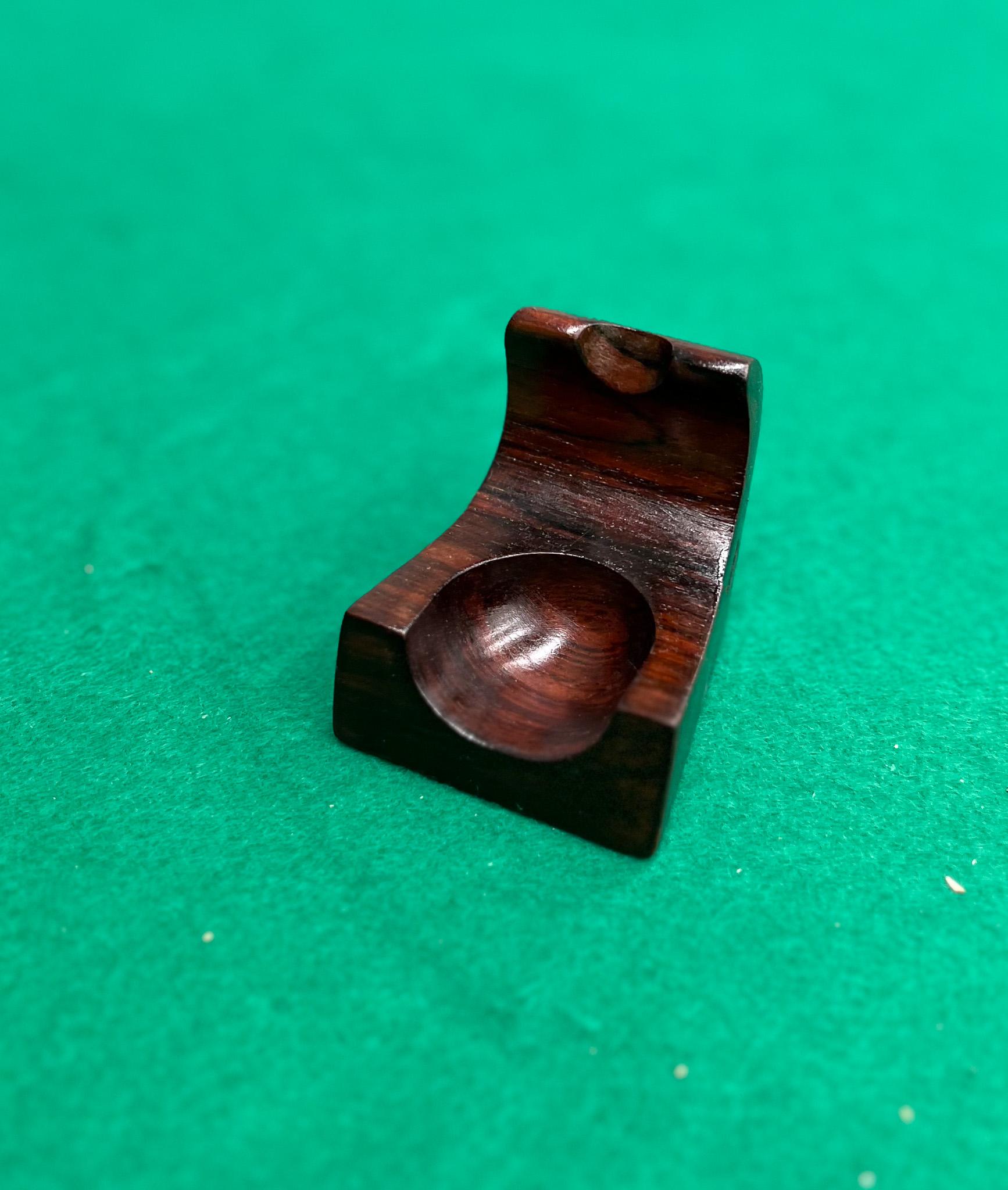 Available today, this Brazilian modern pipe holder, designed by WoodArt, is gorgeous. Handcrafted with Brazilian rosewood (also known as jacaranda), this large pipe holder has beautiful patterns and textures. It has a deep, dark, and rich tone with