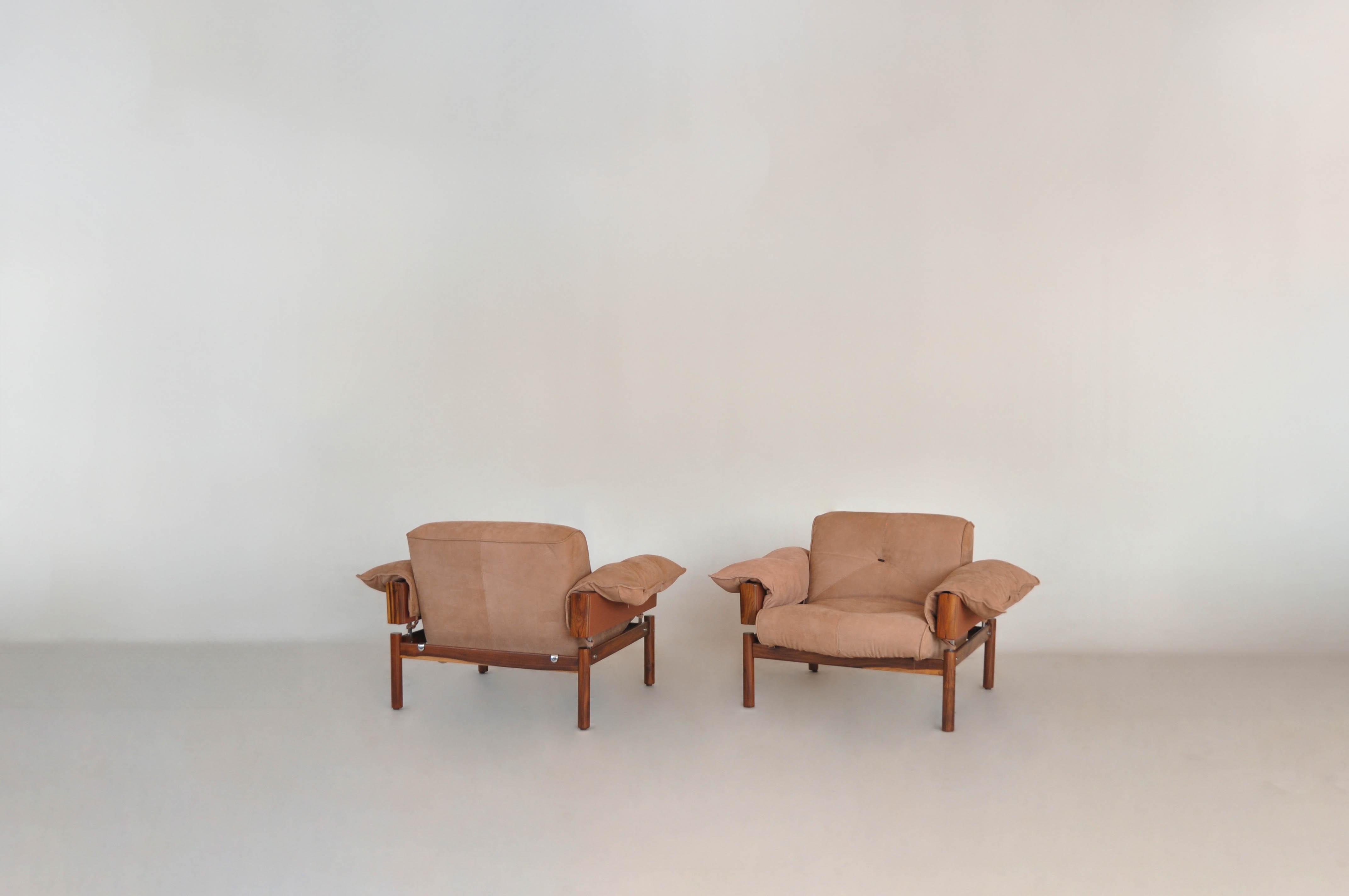 Pair of the iconic MP-13 armchair designed by Percival Lafer. Its upholstery is simply supported on the wooden base through metallic elements, providing structural lightness and comfort.

Percival Lafer was born in Brazil in 1932 and graduated in
