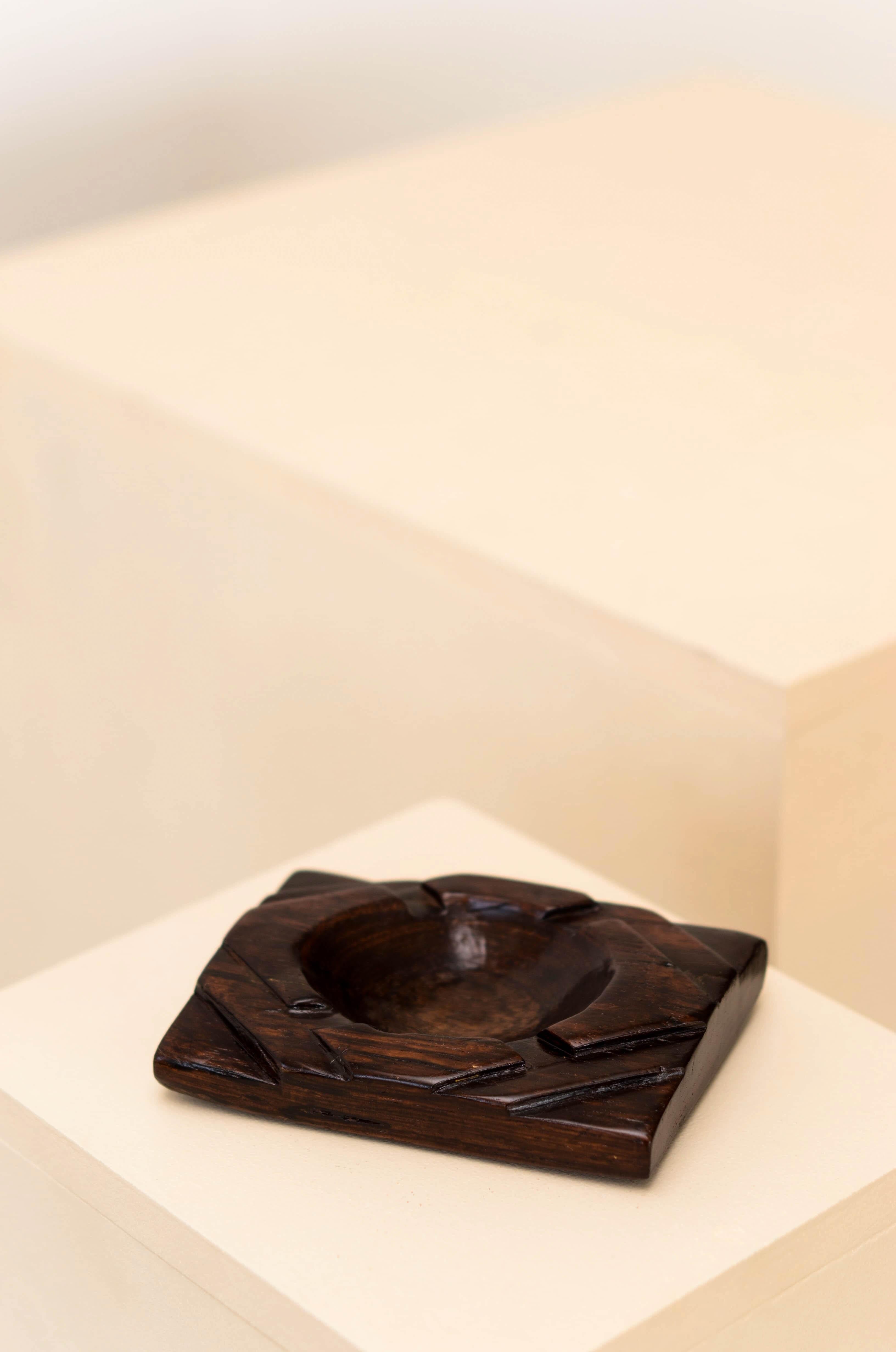 Rustic midcentury ashtray carved in brazilian rosewood of unknown authorship. 