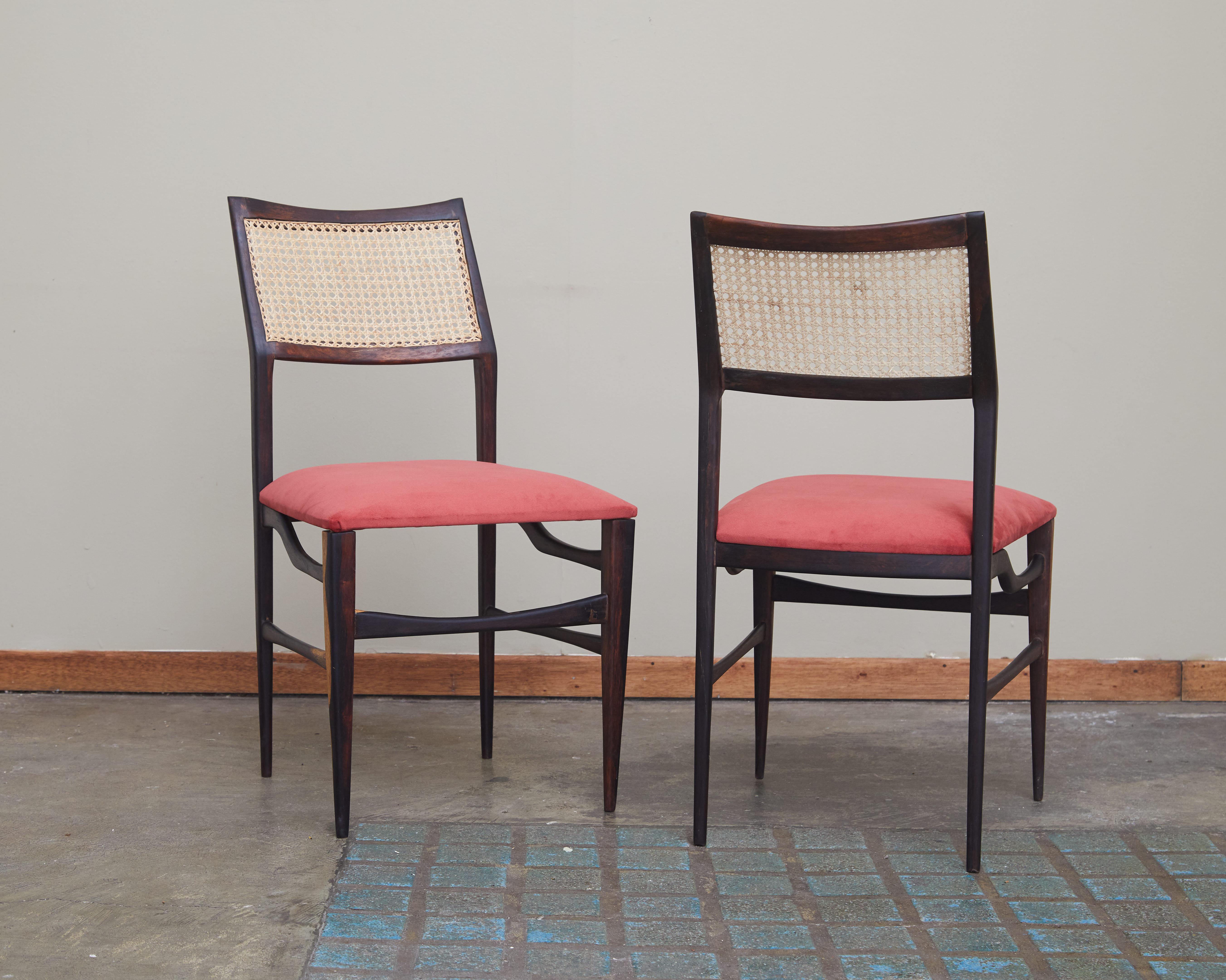 Brazilian midcentury upholstered set of 2 chairs in rosewood and natural plaited cane attributed to Joaquim Tenreiro, who was the great precursor of modern furniture in Brazil, masterfully using brazilian wood to produce furniture that represented