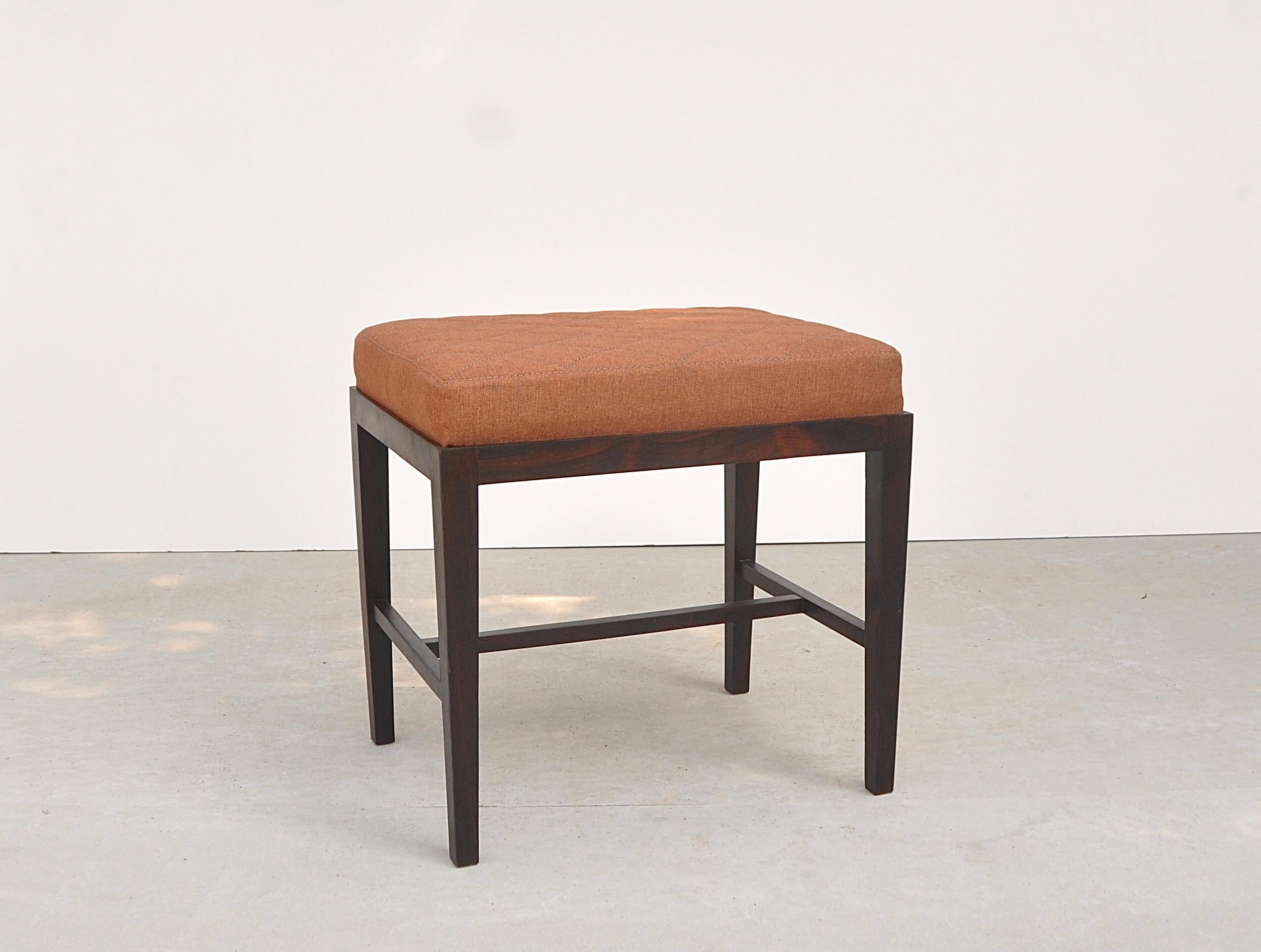 Brazilian upholstered stool with structure in solid rosewood by unknown author.