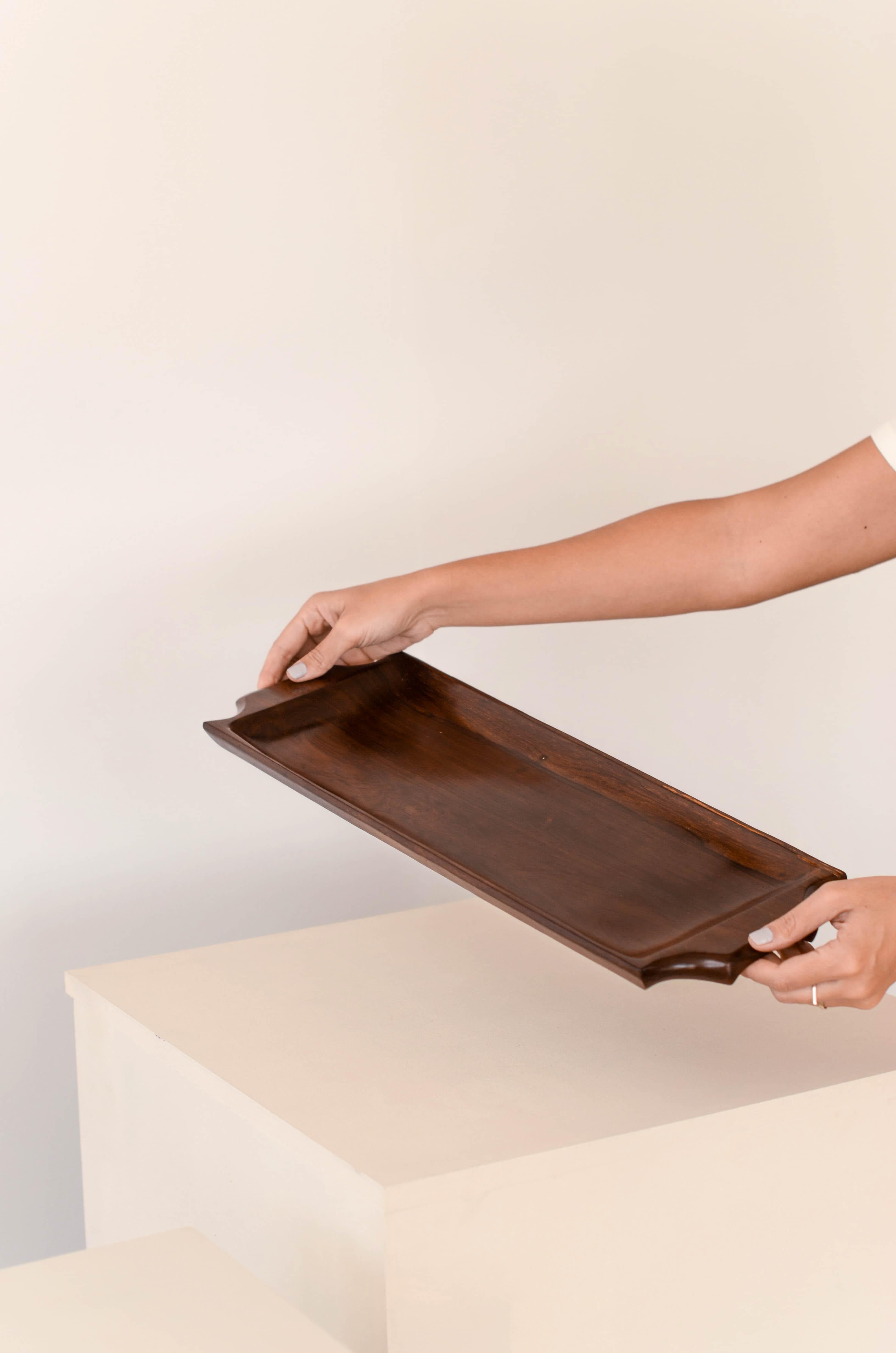 Beautiful tray carved from a single piece of Brazilian rosewood of unknown authorship.