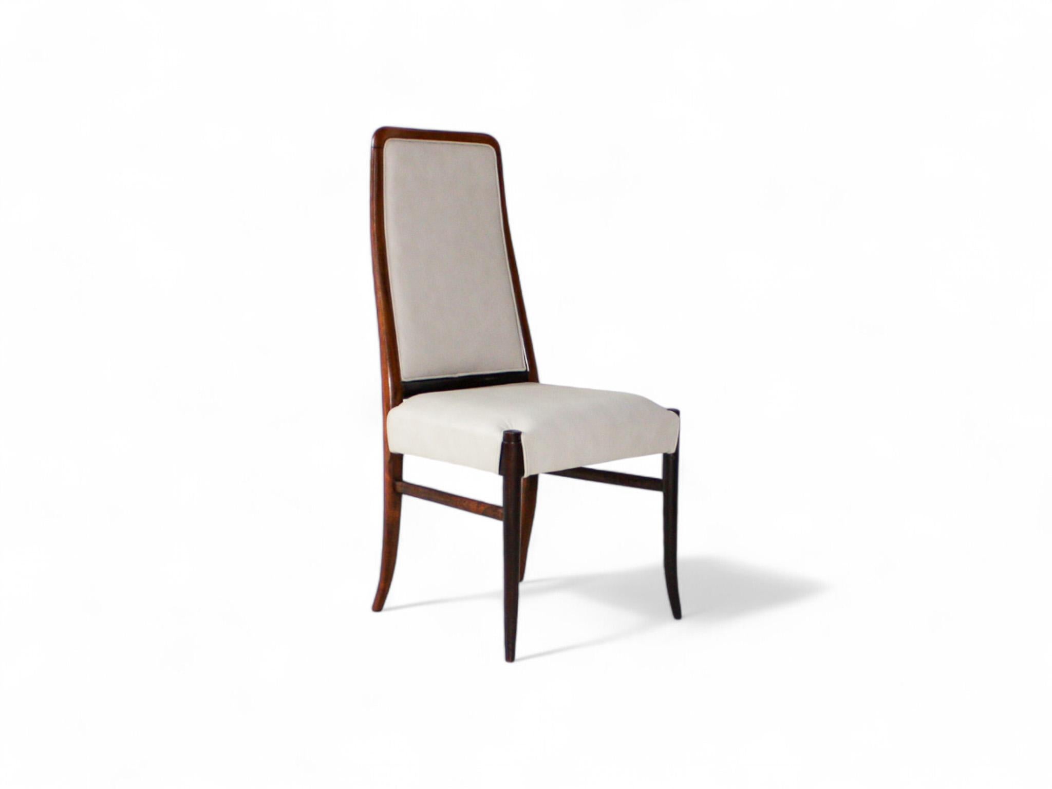 Available today, this magnificent Mid-Century Modern ten dining chair set n hardwood & beige leather by Joaquim Tenreiro in the sixties is the find of the year!

Each chair features a solid Rosewood structure upholstered in beige leather. The legs