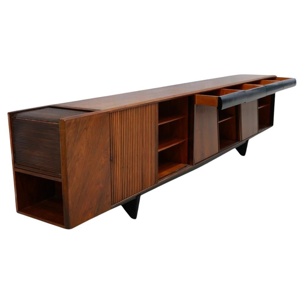Available today in NYC, this 11.5�” Credenza in Hardwood by Carlo Hauner & Martin Eisler, Brazil, c. 1950 is nothing less than magnificent!

This credenza is made with the finest Brazilian rosewood, also known as jacaranda, and has four drawers, four