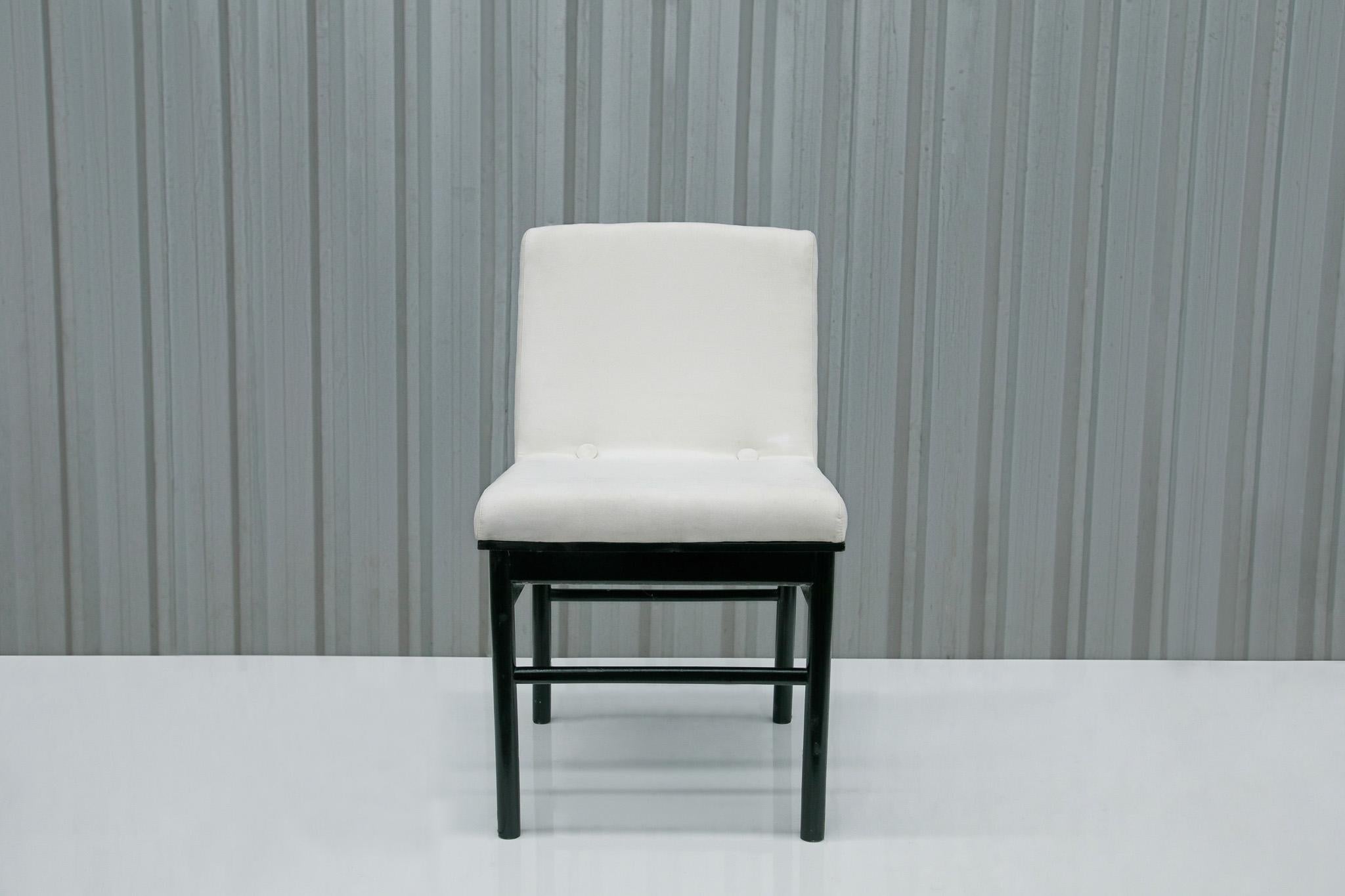 Available now, this very Brazilian Modern six chair set in off white velvet and hardwood with Ebony finish, designed by Novo Rumo is simply spectacular!

Each chair features a hardwood structure with four legs. The seat and backrest are one piece