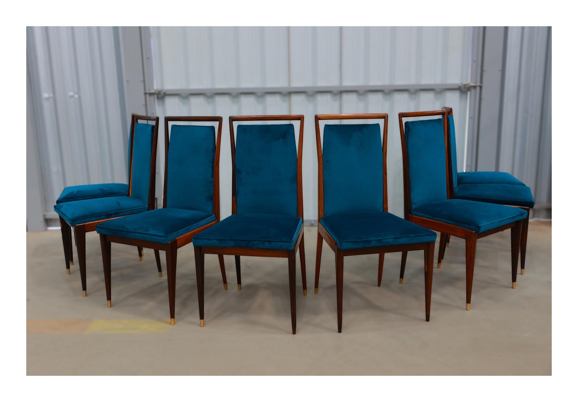Available today, this Brazilian Modern 8 Chair Set in Hardwood & Fabric, Giuseppe Scapinelli is fantastic!

This sculptural and elegant set of 8 dining chairs features a tall backrest and tapered legs with a brass cap. Both the back and seat rest