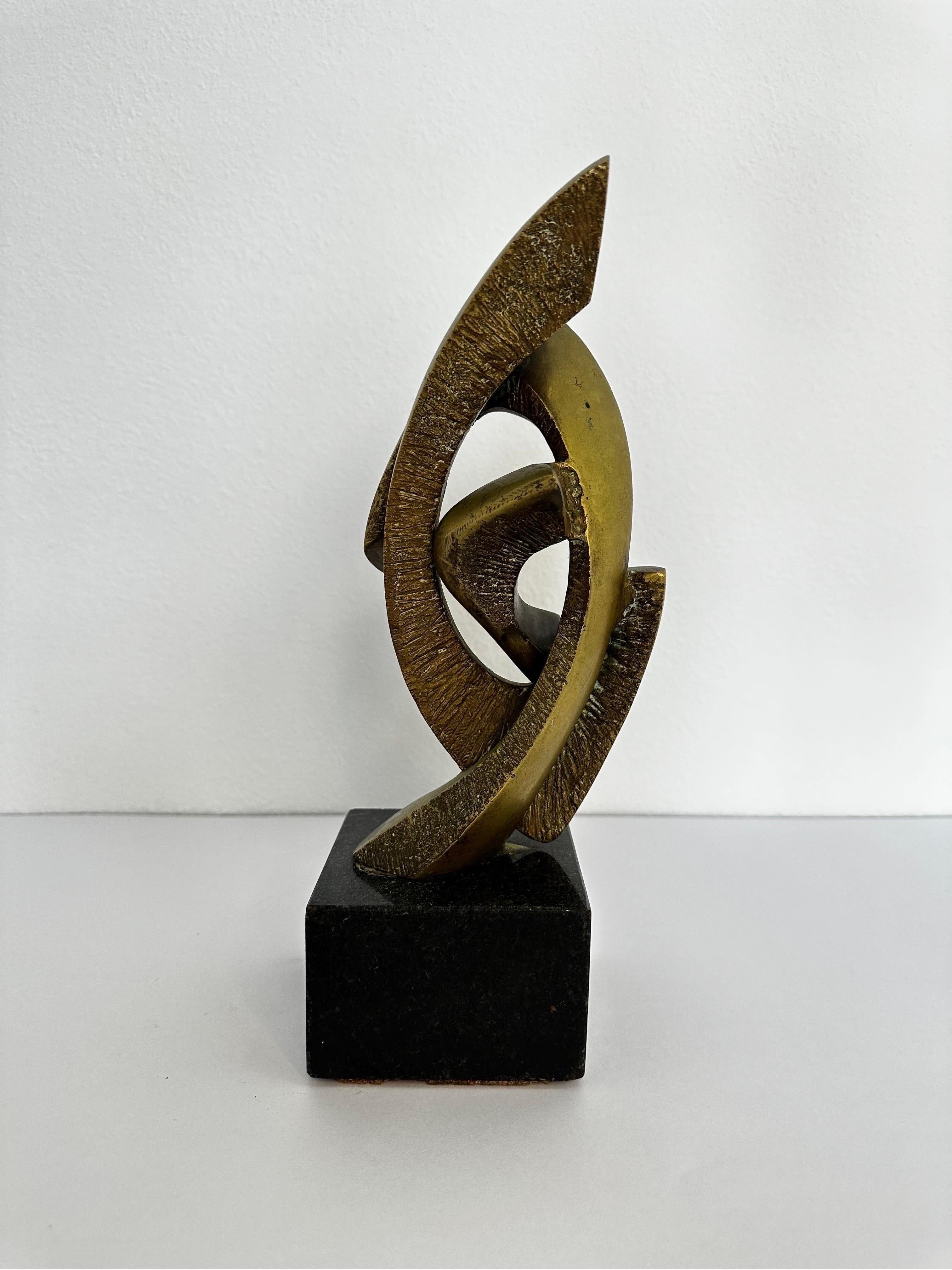 Bronze abstract geometric sculpture on Granite base by unknown artist.  Unsigned.  Circa 1980s.