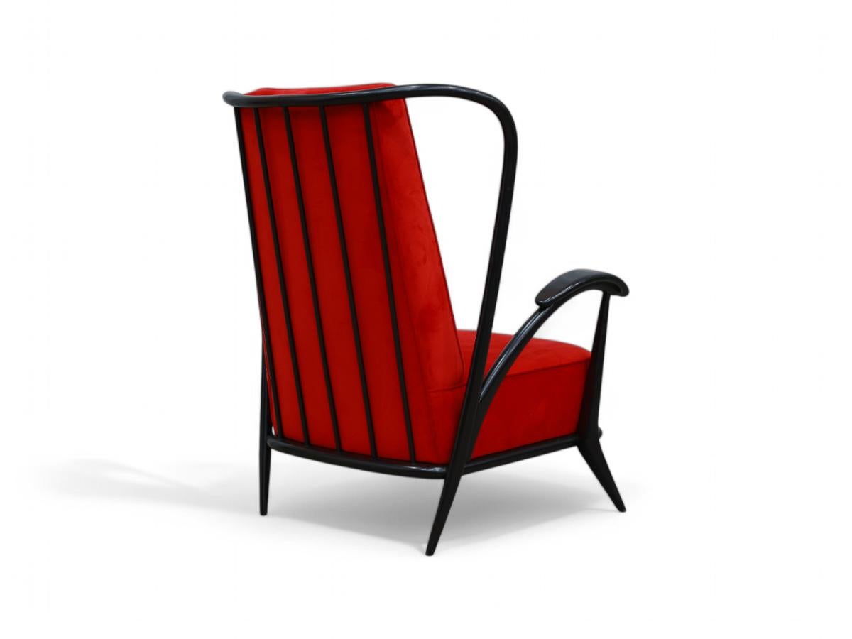 Available today, this sculptural Mid-Century Modern armchair in hardwood and red velvet by Giuseppe Scapinelli made in the fifties is absolutely gorgeous!

The vintage armchair is made in Pau Marfim hardwood with Ebony finish in red velvet. It has