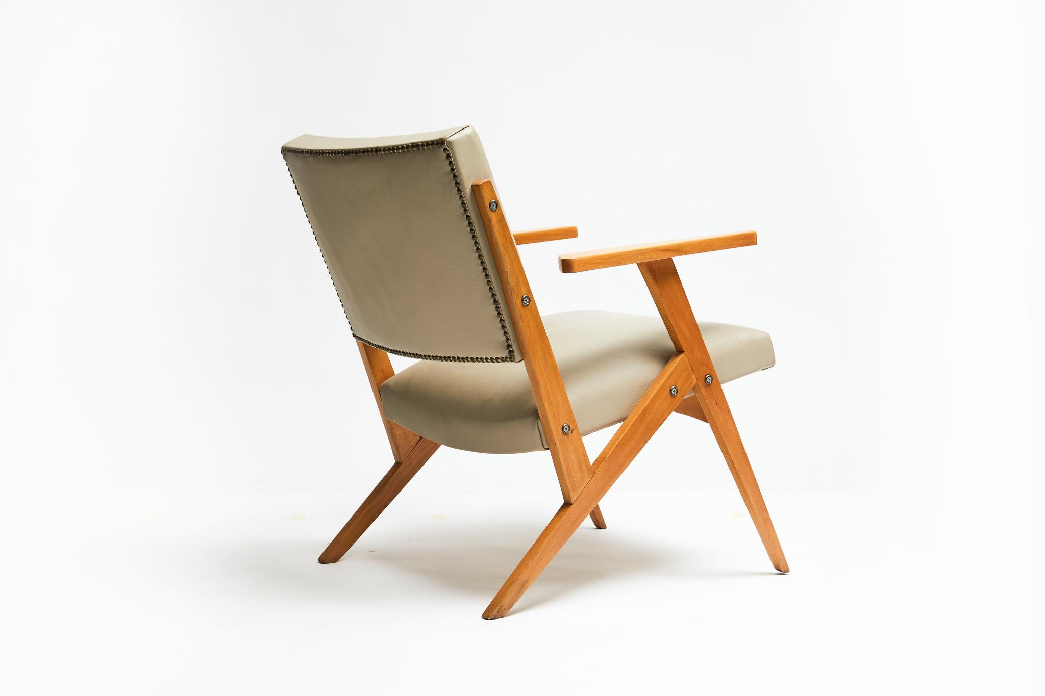 Hand-Carved Brazilian Modern Armchair in Wood & Mint Faux Leather, Jose Zanine Caldas, 1950s For Sale