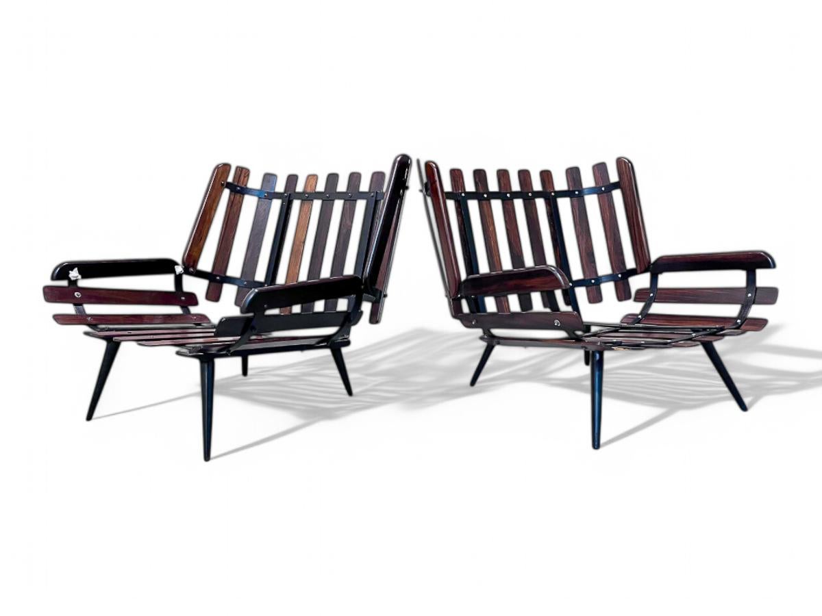 Available today,  this pair of Brazilian Modern Armchairs in Hardwood & Boucle by Carlo Hauner & Martin Eisler for Forma made in the 50's is nothing less than spectacular!

This iteration of the Costela armchair was crafted by Carlo Hauner and