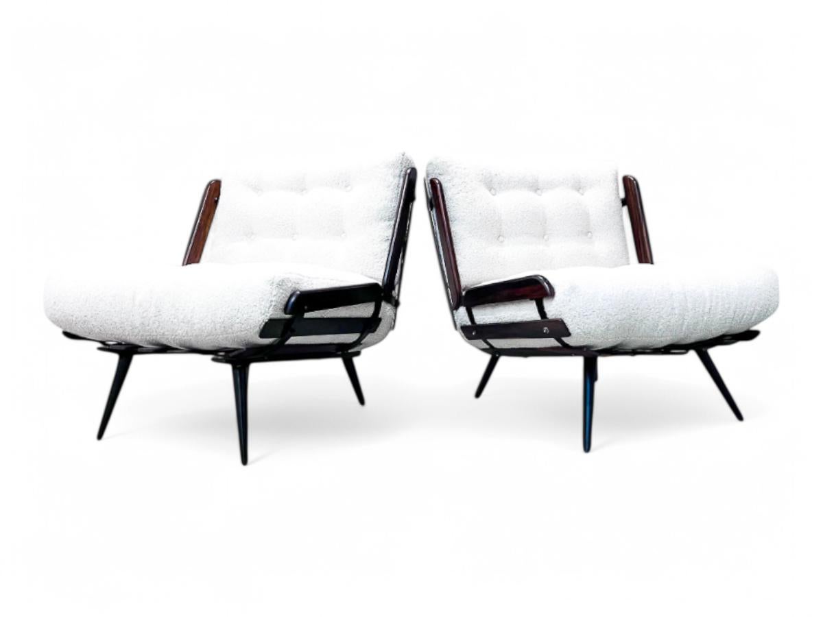 Available today,  this pair of Brazilian Modern Armchairs in Hardwood & Boucle by Carlo Hauner & Martin Eisler for Forma made in the 50's is nothing less than spectacular!

This iteration of the Costela armchair was crafted by Carlo Hauner and