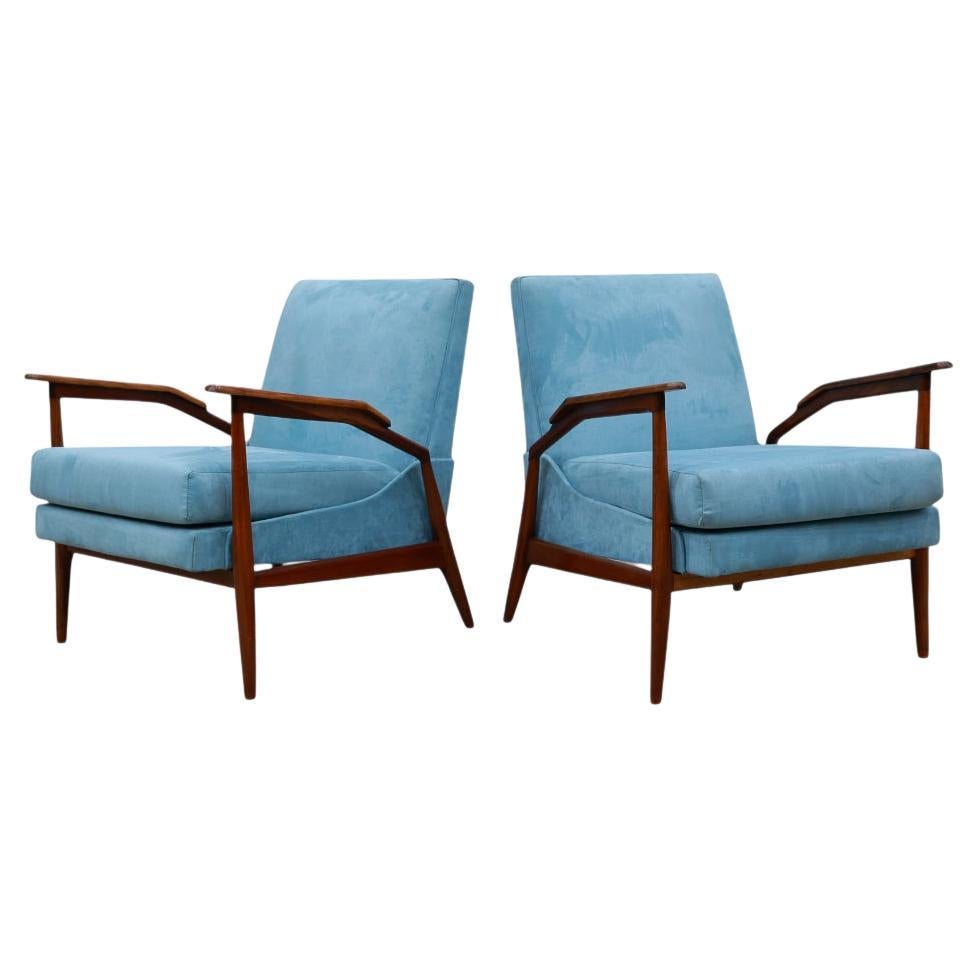 Available today, with domestic shipping in the NYC metro area included, this Pair of Armchairs in Hardwood and Fabric by Giuseppe Scapinelli, c. 1950s, is nothing less than gorgeous! 

These two chairs feature frames crafted from Caviuna hardwood,