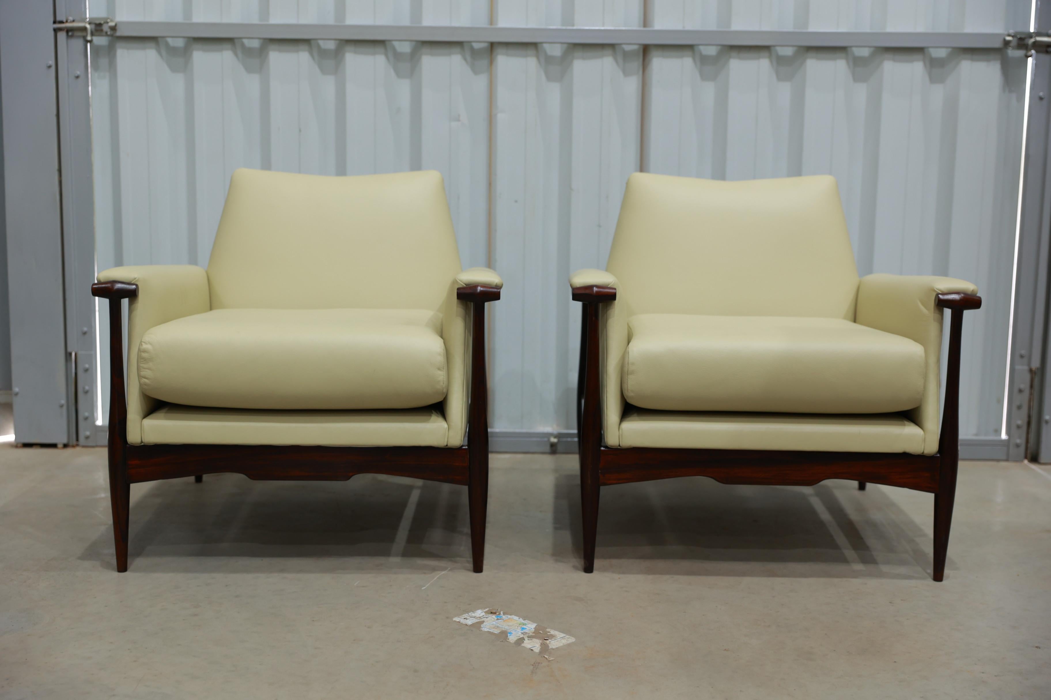 Available today, these Brazilian Modern Armchairs in Hardwood & Leather by Liceu de Artes made in Brazil during the 1960s are nothing less than spectacular!

What makes this mid-century pair of armchairs so special is the sleek design combined with