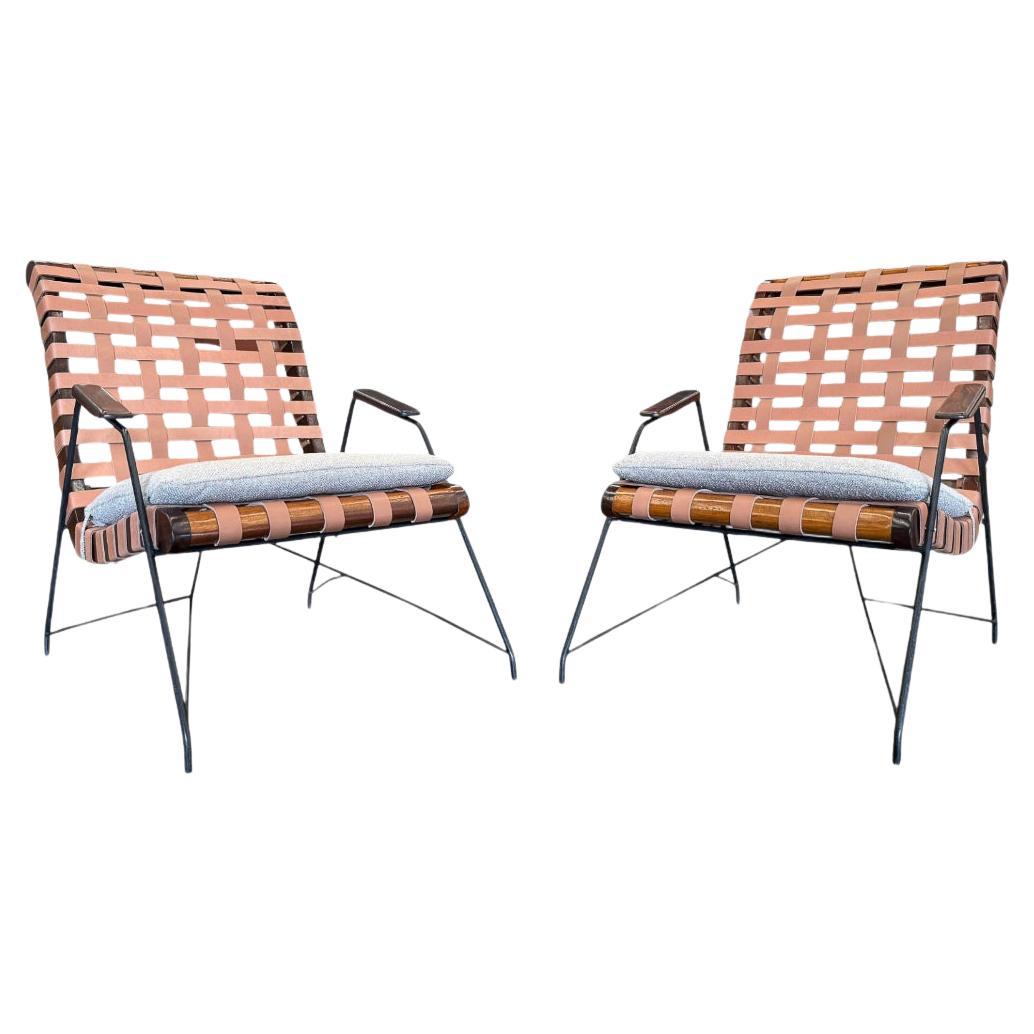 Available today, this unique pair of Brazilian Modern Armchairs designed by Carlo Hauner in the 1950s are nothing less than spectacular!

This and one-of-a-kind set showcase a gracefully curved silhouette crafted from beautifully aged Rosewood. The