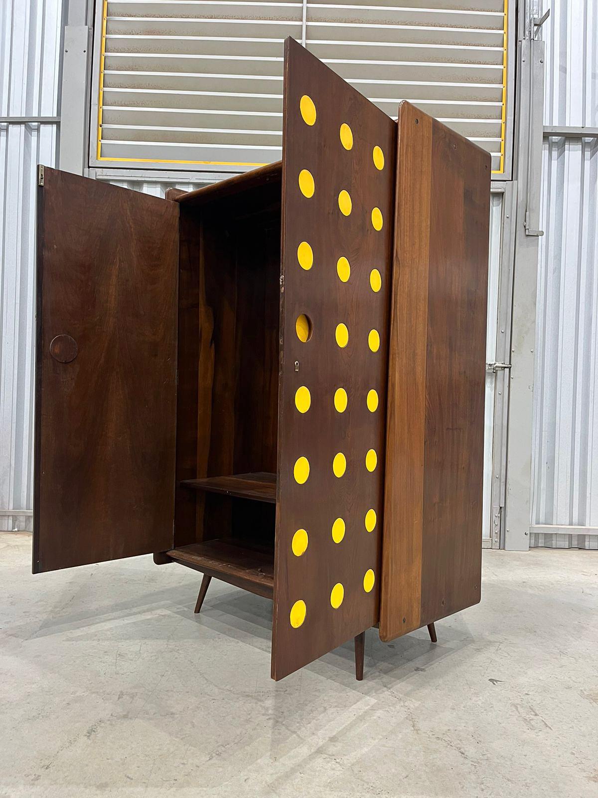Available today, this one-of-a-kind Brazilian Modern Armoire in Hardwood by  Moveis Cimo in the fifties is a very rare FIND and is gorgeous!

The armoire is entirely made in Imbuia hardwood and features a rectangular structure with curved ends, two