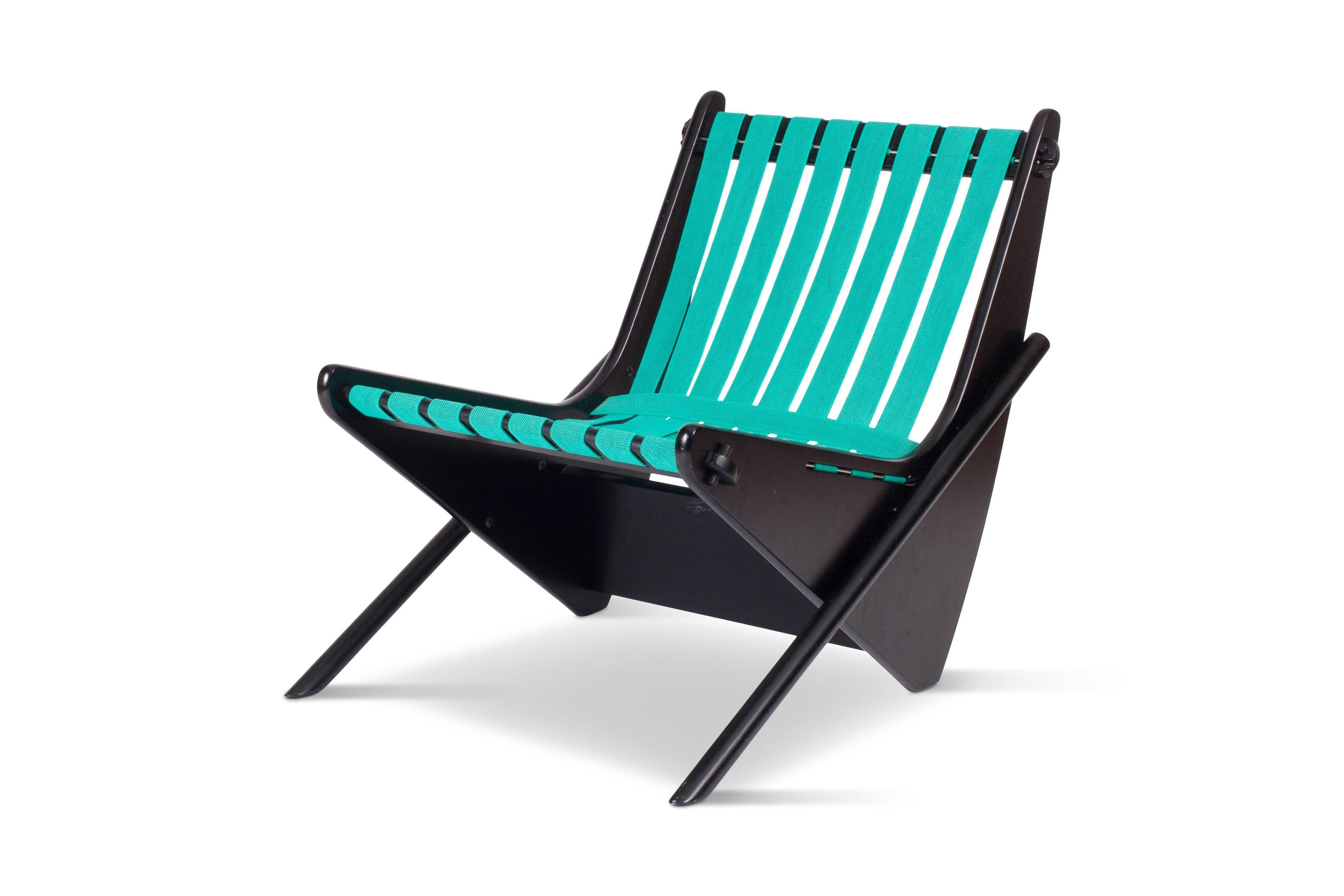Richard Neutra, 'Boomerang' lounge chair, Brazil
This limited edition chair was manufactured by Bona SRL Italy in the 1980s.
The black lacquered wooden frame holds a bright green webbing that
creates a comfortable seat. The wooden elements of the