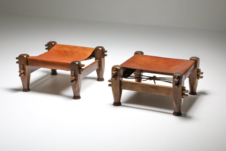 Brazilian modern, Brutalist, brown leather and Caviuna pair of stools in a Brutalist 1960s Bohemien chic.
Measures: L 73 cm, D 73 cm, SH 36 cm.
      