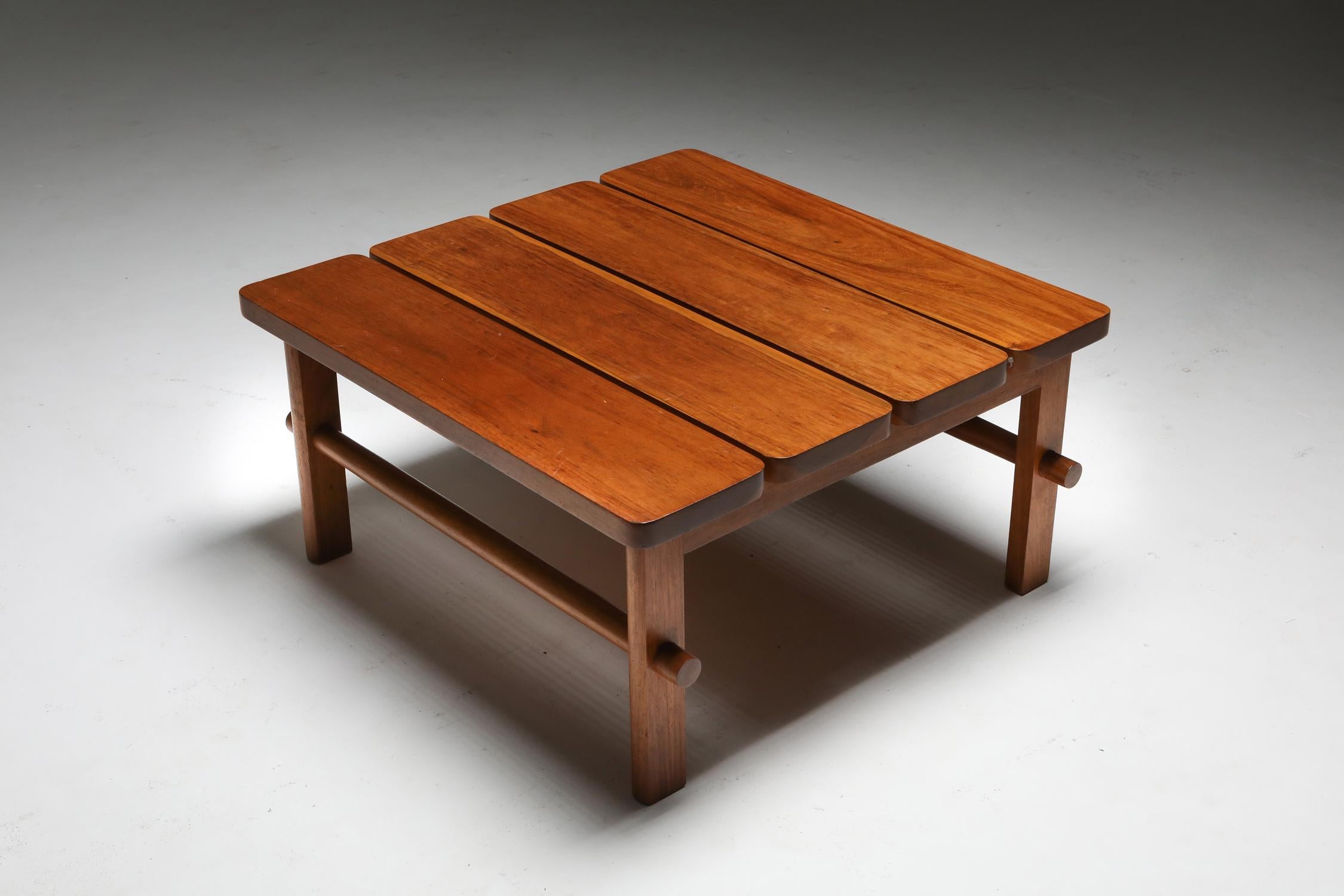 Hardwood Mid-Century Modern coffee table, Brazil, the 1960s

Simple and elegant design
Form and function
All characteristics of this piece refer to great design
Think Joaquim Tenreiro, Sergio Rodrigues and others.

