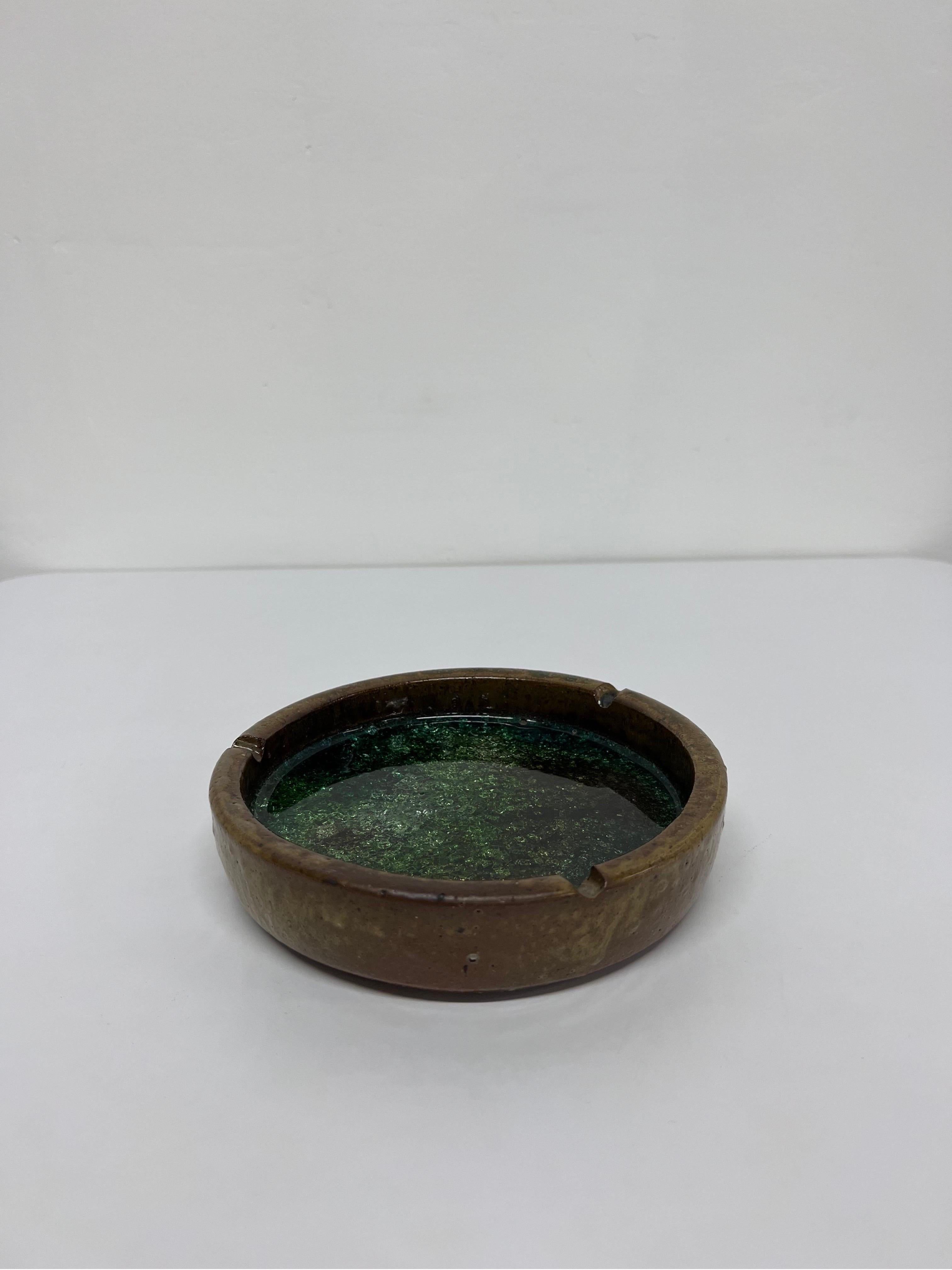 Mid-century Brazilian modern ceramic ashtray or catchall with crackled green glass and cork bottom, 1950s.